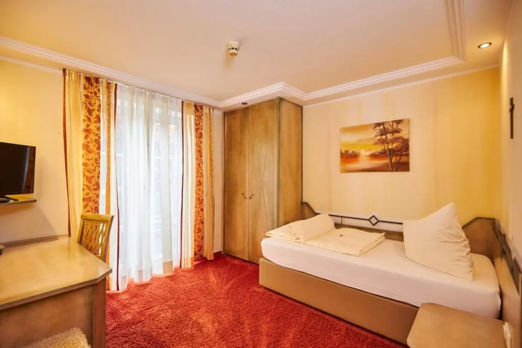 Bed in Flair Hotel Zum Schwarzen Reiter