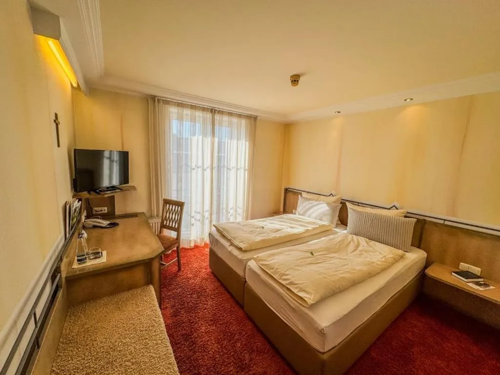 Bed in Flair Hotel Zum Schwarzen Reiter