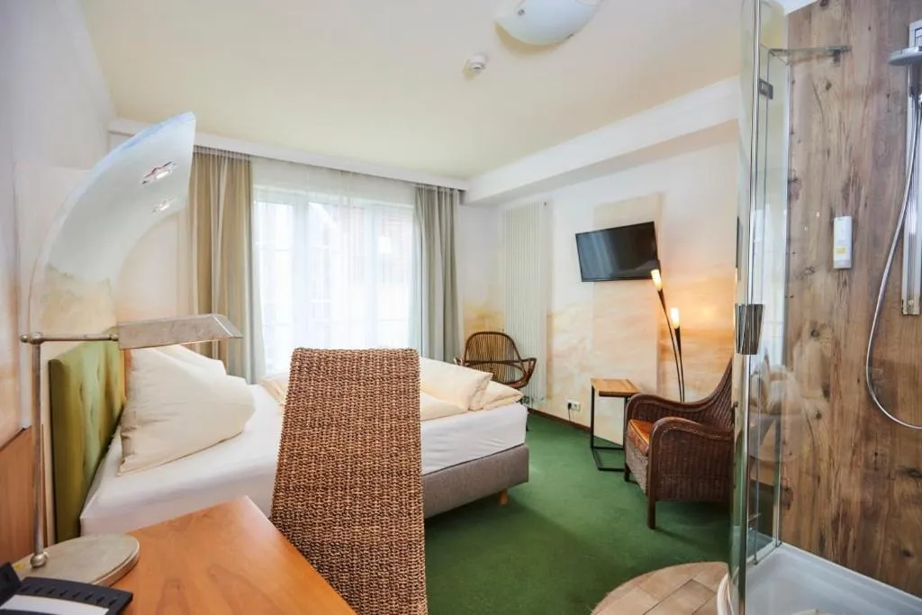 Bed in Flair Hotel Zum Schwarzen Reiter