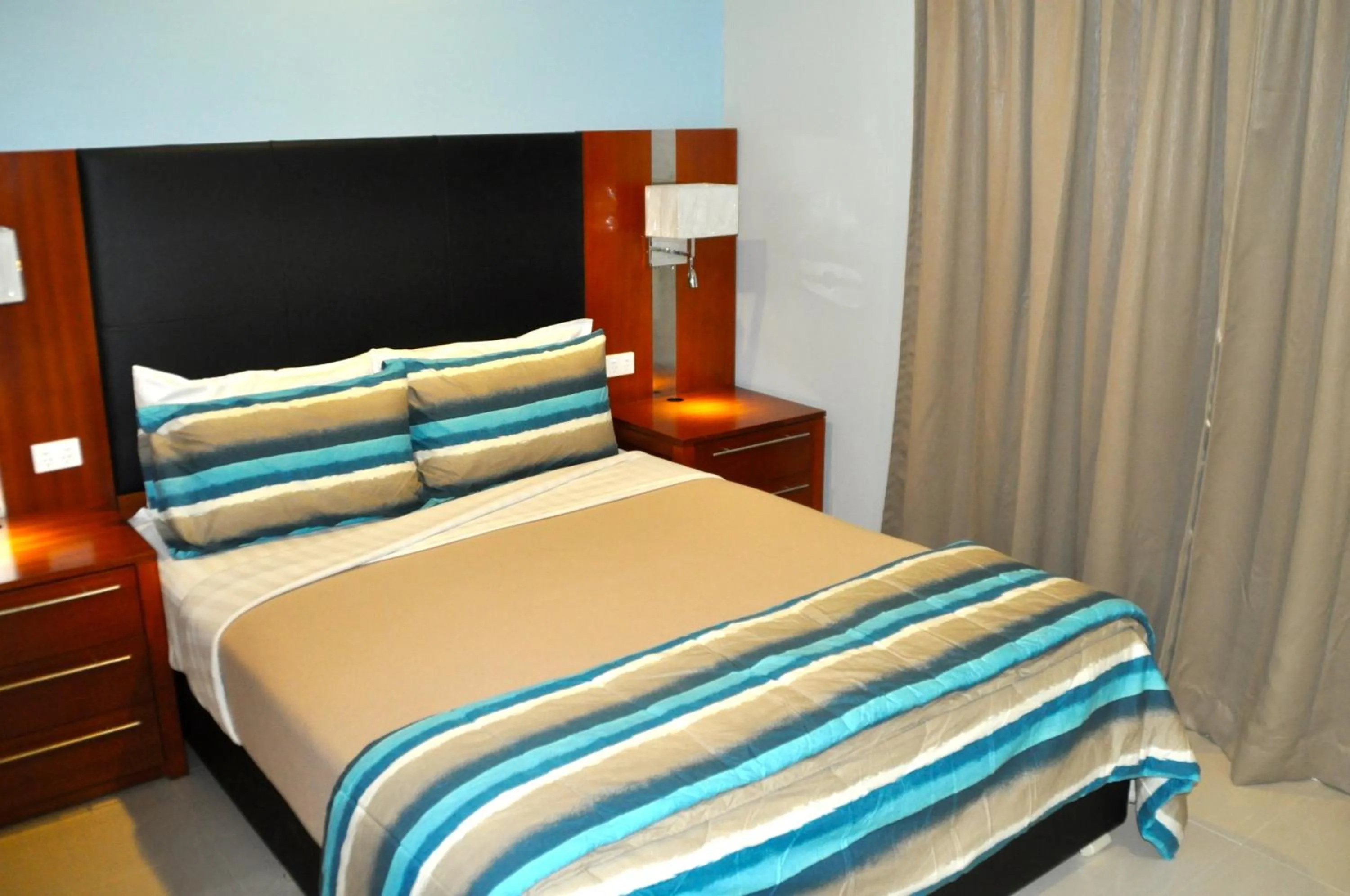 Bed in Madang Resort