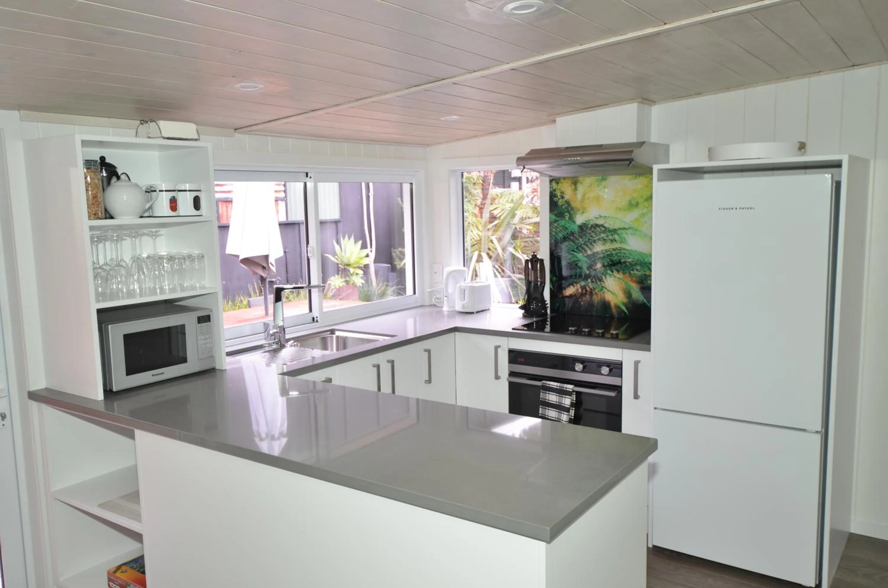 Kitchen or kitchenette in Wairua Lodge - Rainforest River Retreat