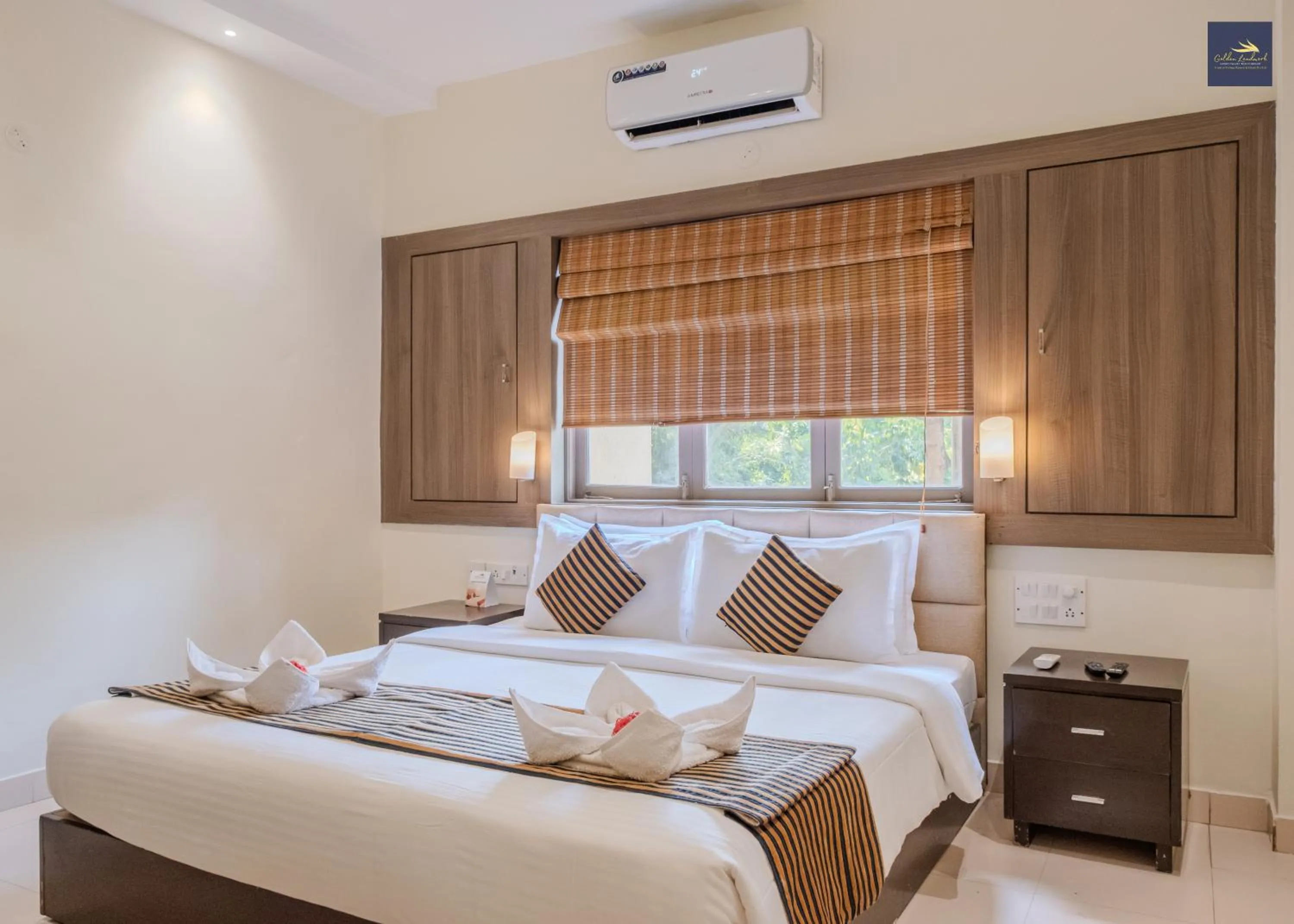 Bed in Golden Landmark Green Valley Beach Resort