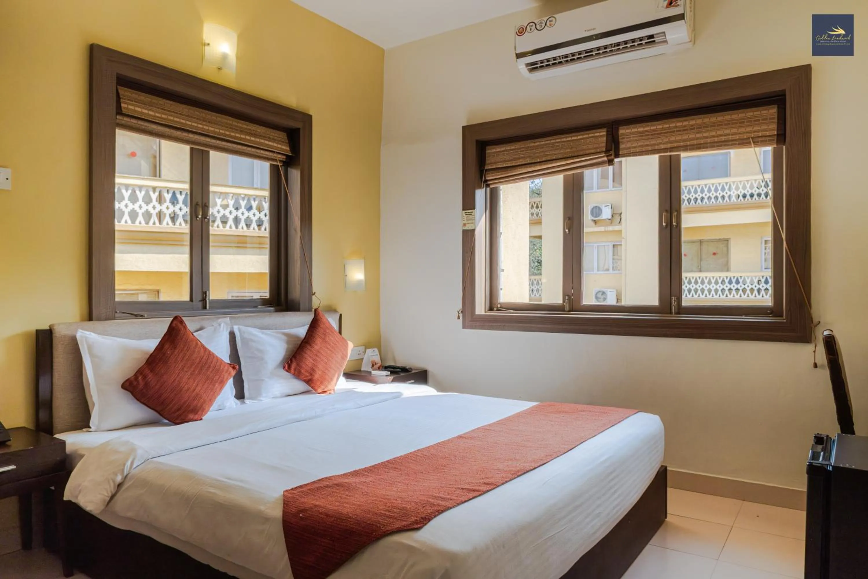 Bed in Golden Landmark Green Valley Beach Resort