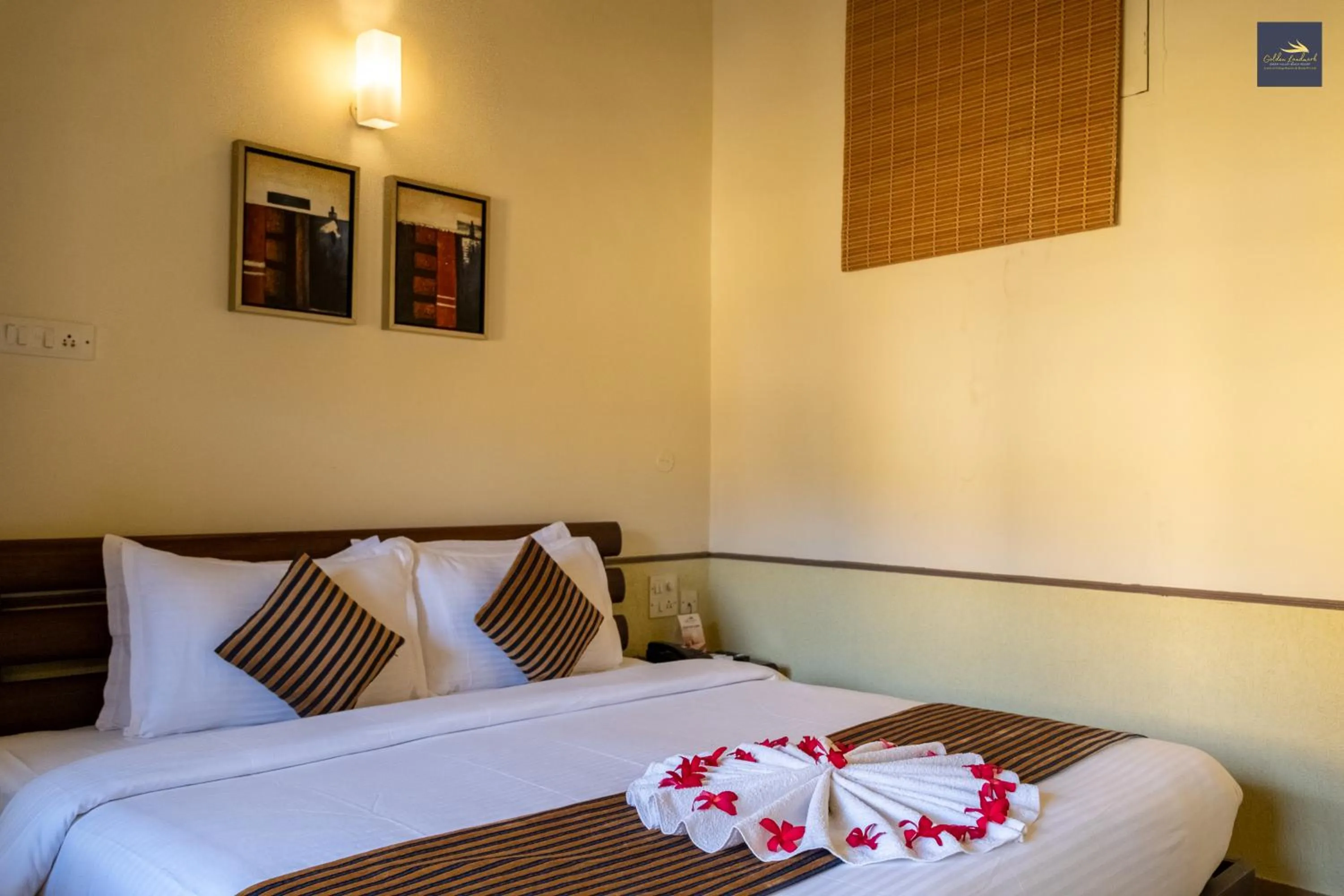 Bed in Golden Landmark Green Valley Beach Resort