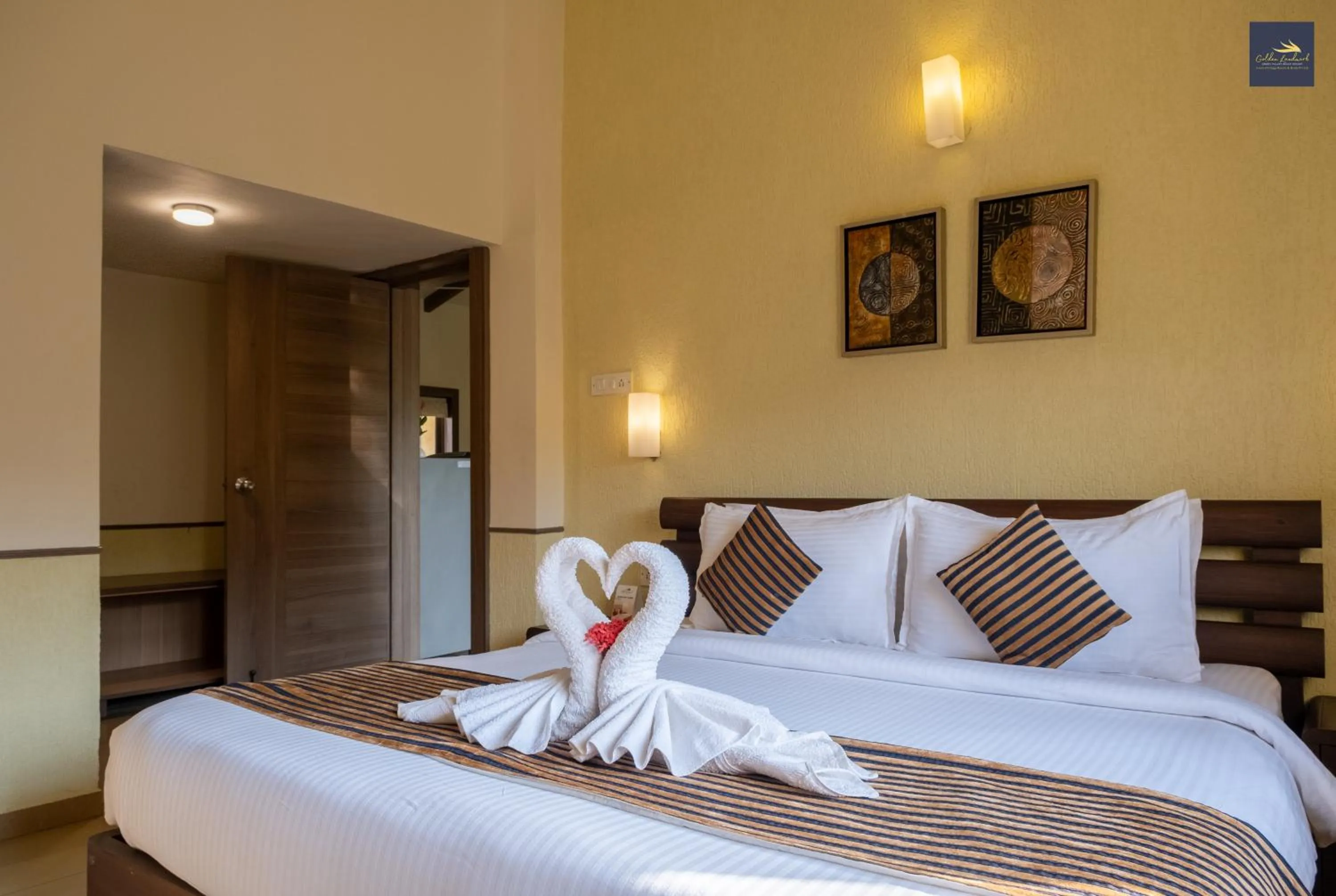 Bed in Golden Landmark Green Valley Beach Resort