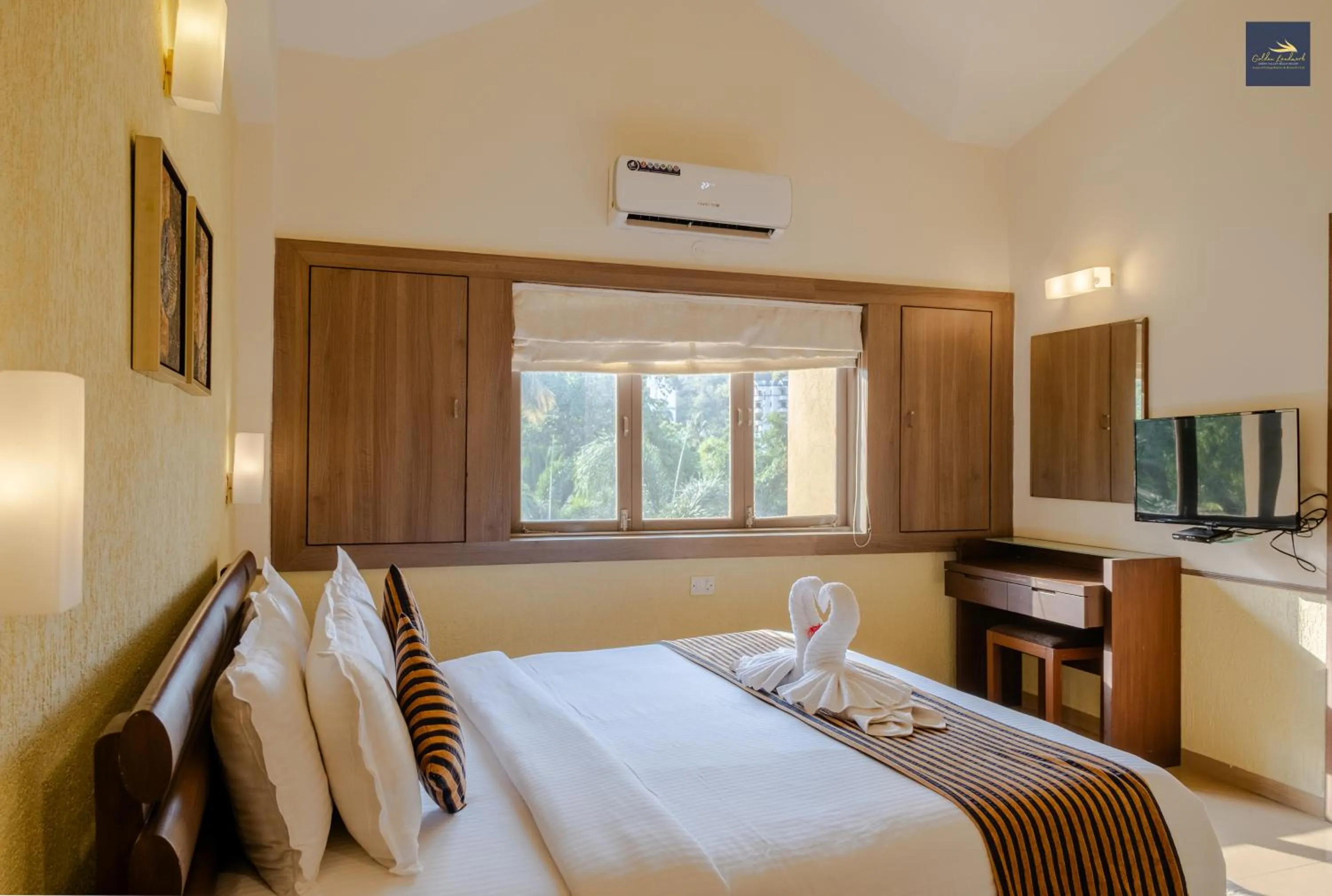 Bed in Golden Landmark Green Valley Beach Resort