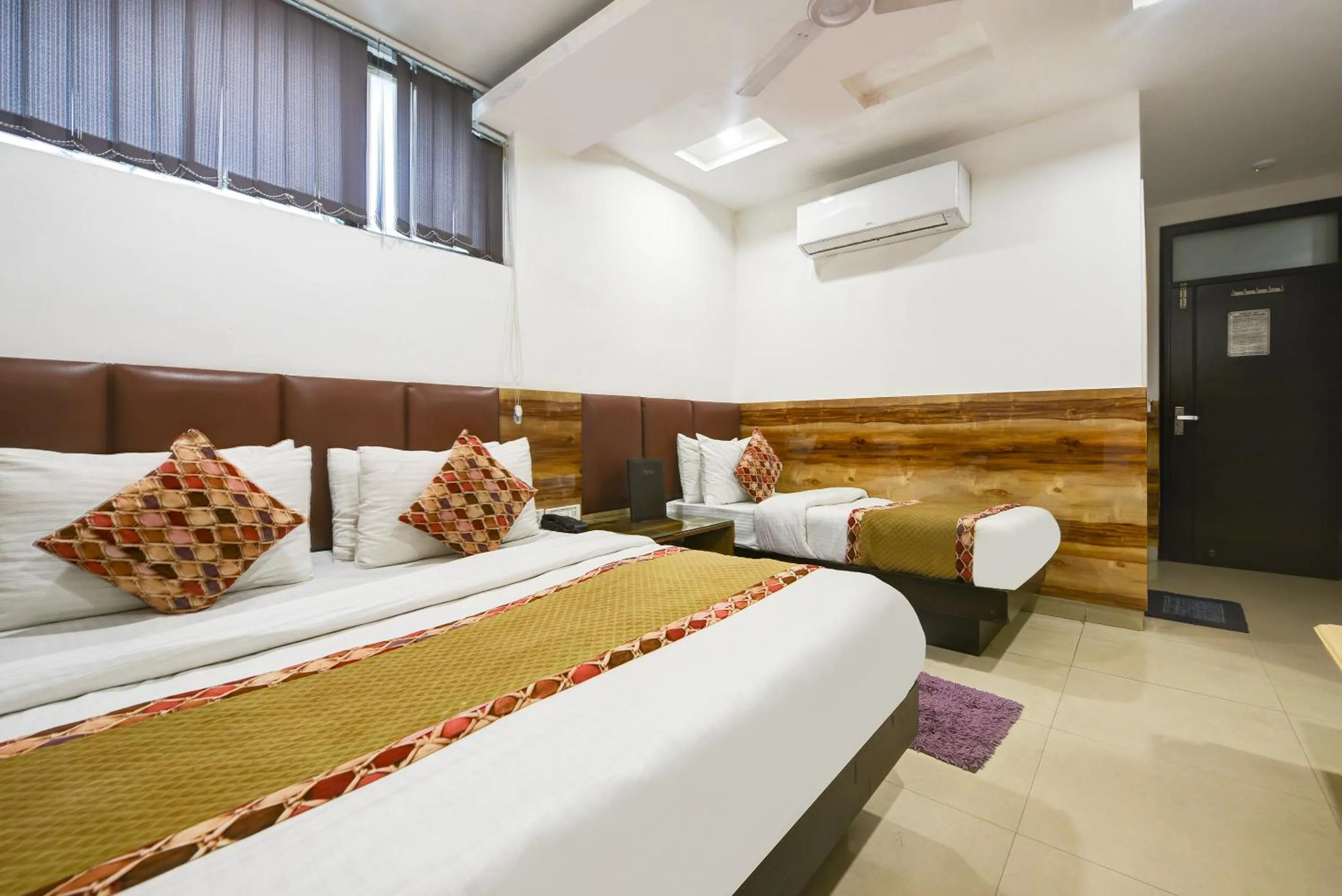 Bedroom, Bed in Hotel Shri Vinayak in City Centre at New Delhi Railway Station-By RCG Hotels