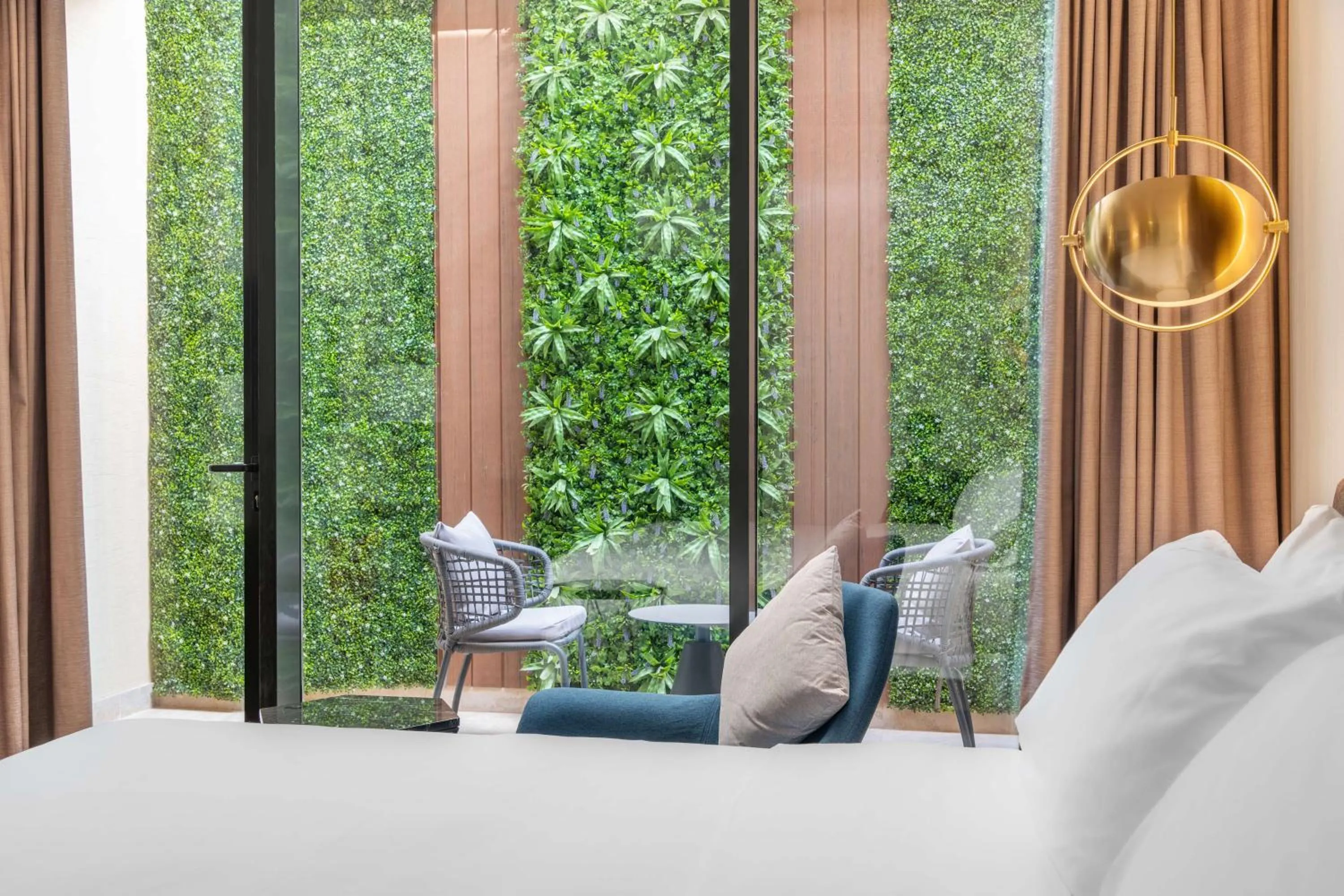 Patio, Bed in Radisson Blu Hotel Riyadh Qurtuba