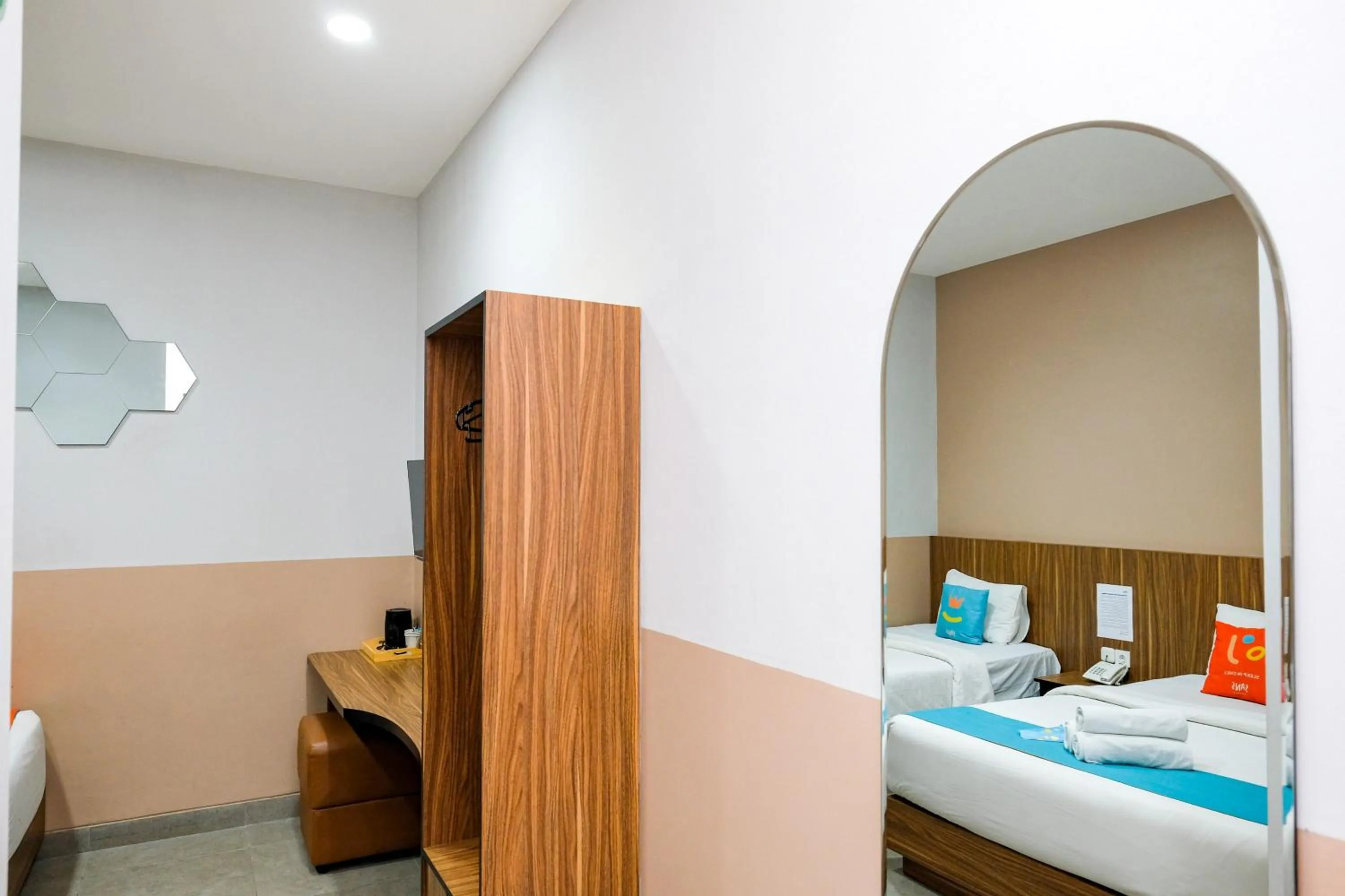 Bedroom, Bed in Sans Hotel Rajawali Surabaya by RedDoorz