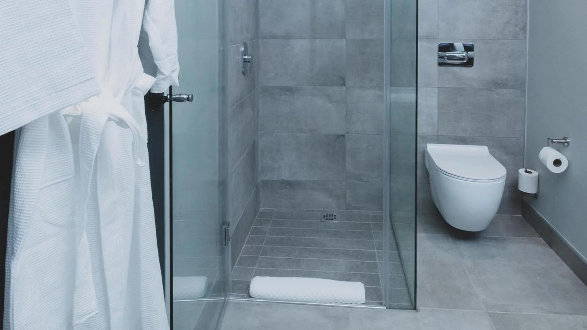 Shower in The Catalyst Apartment Hotel by NEWMARK