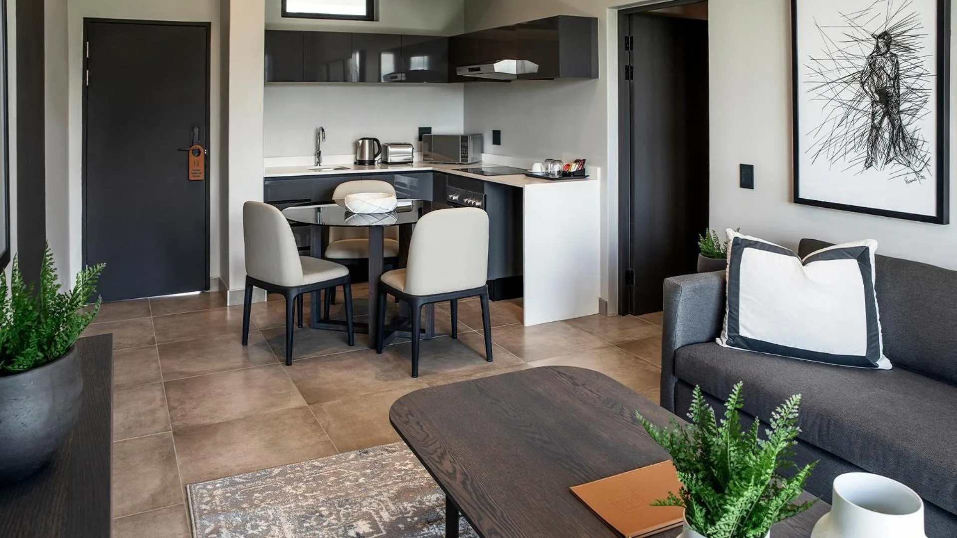 Kitchen or kitchenette in The Catalyst Apartment Hotel by NEWMARK