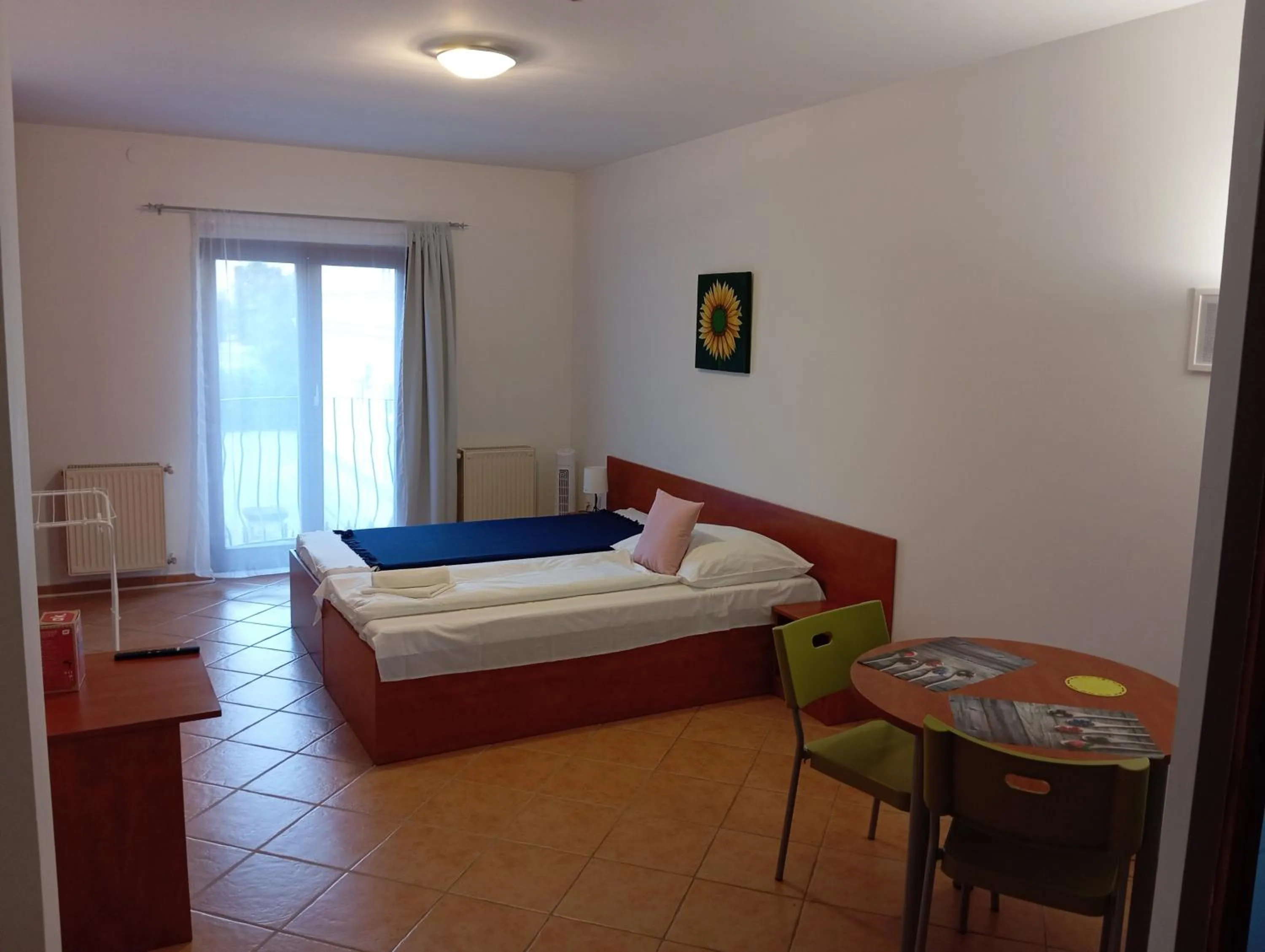 Bed in Szent Kristóf Apartmanhotel