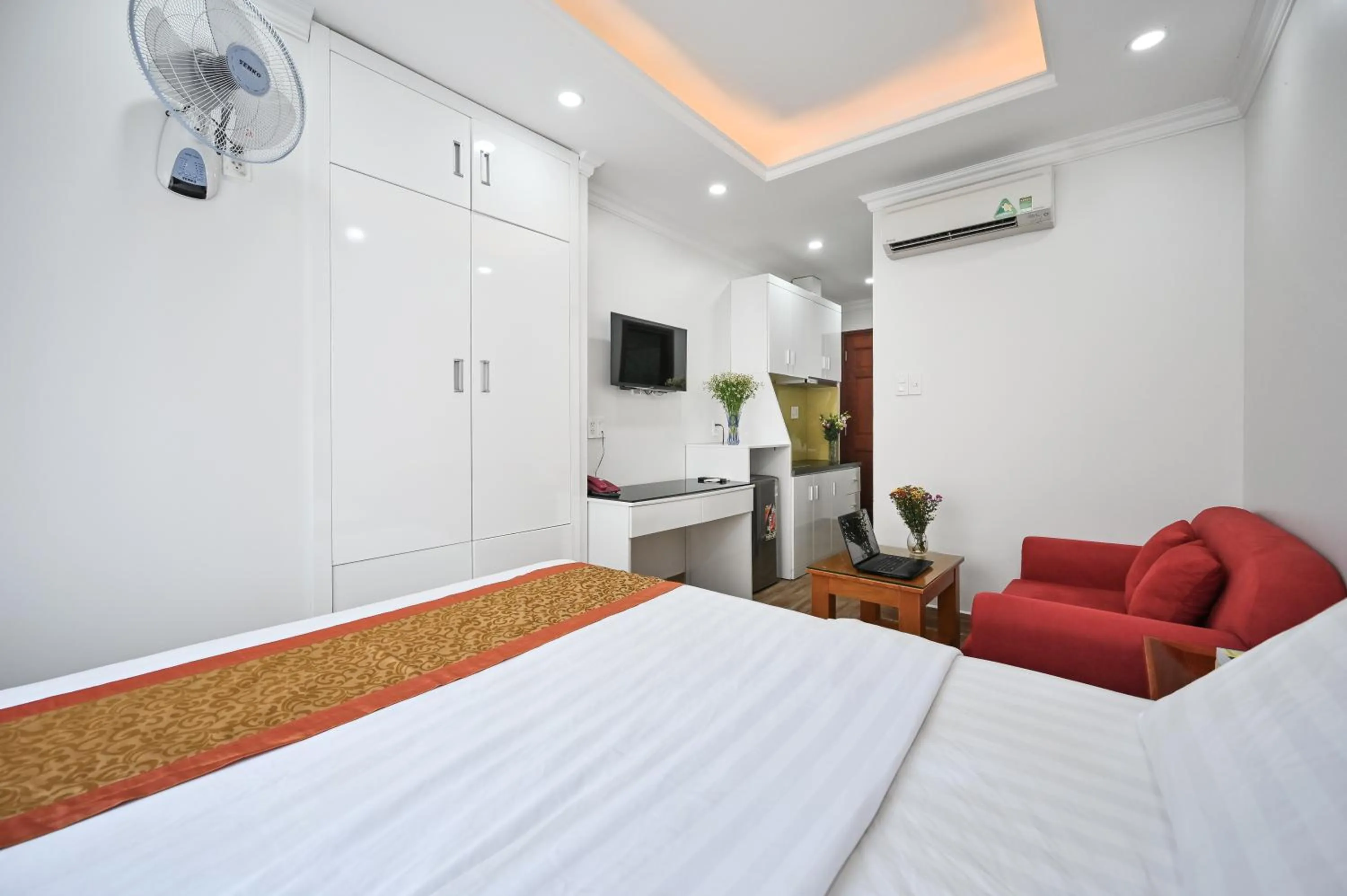 Bed in Genie Hotel & Serviced Apartments