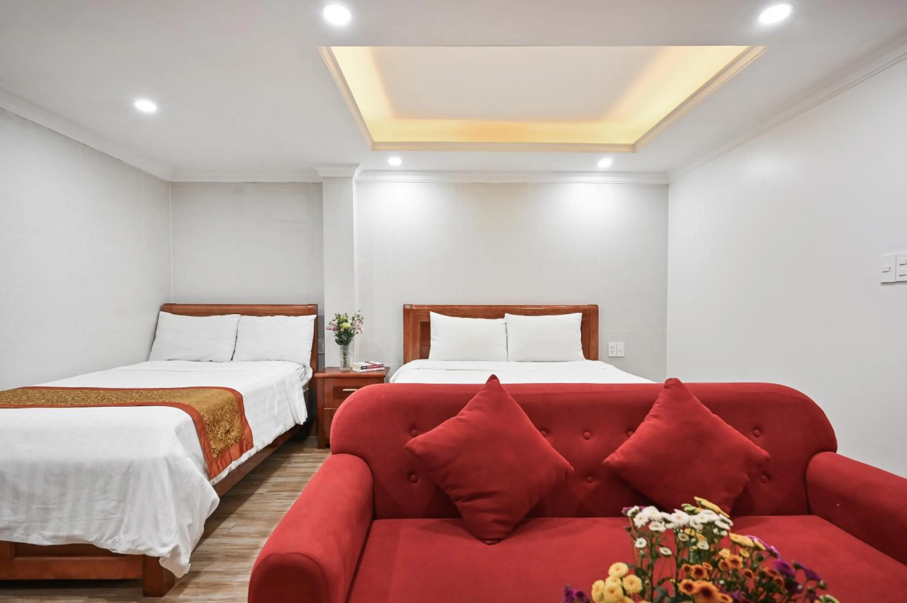 Bed in Genie Hotel & Serviced Apartments
