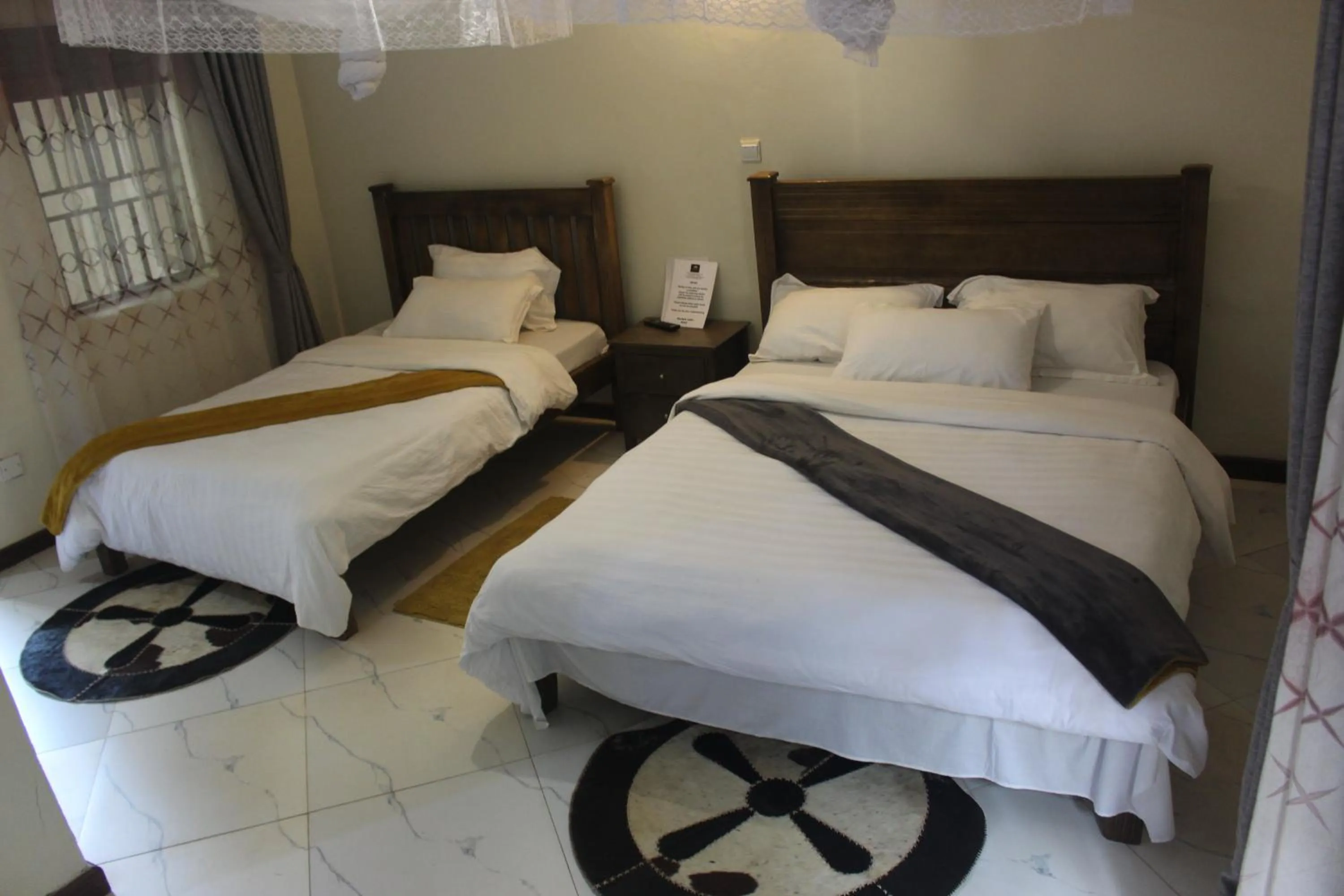 Bed in Montane Safaris Hotel
