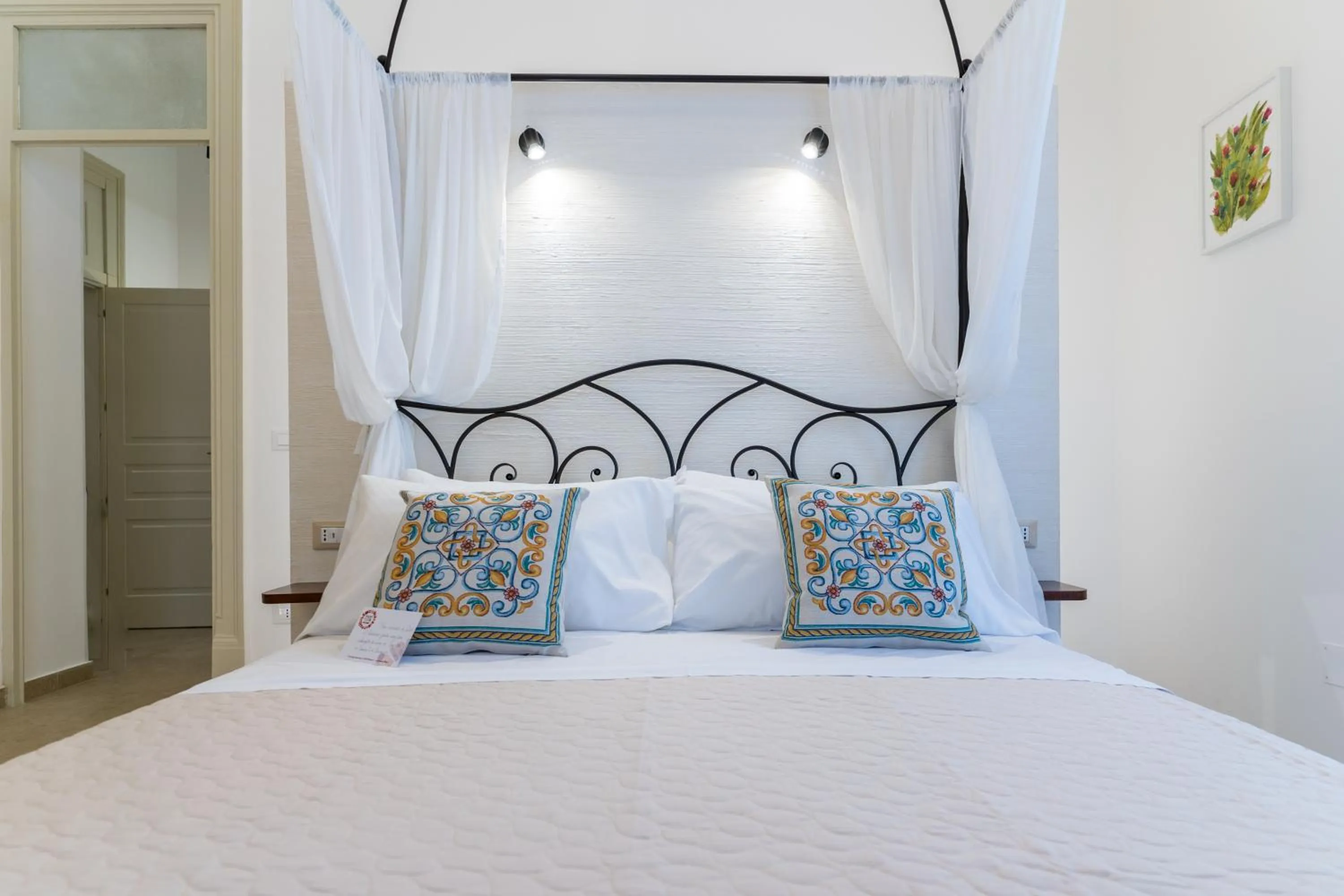 Bed in Mama Tita Rooms and Breakfast