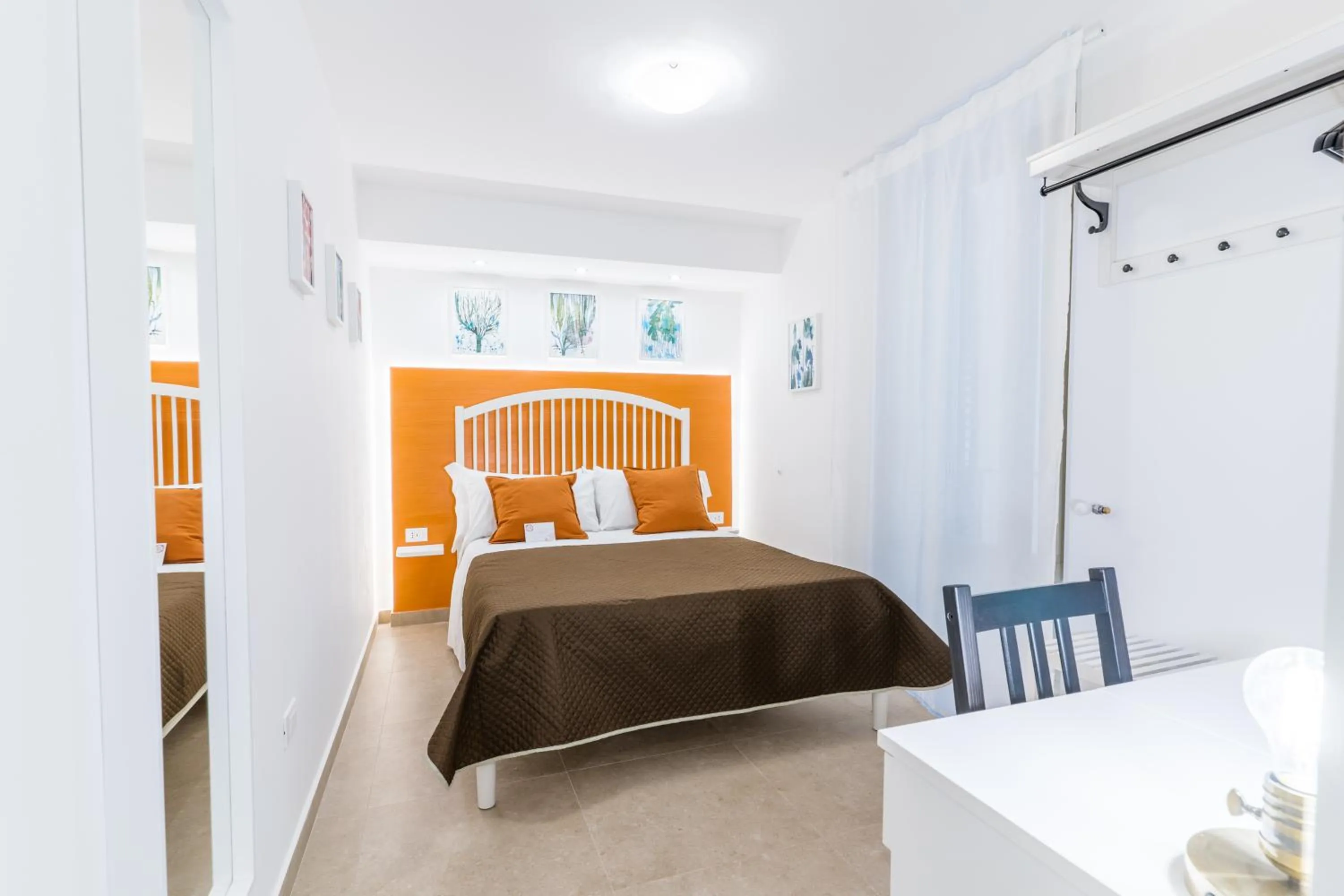 Bed in Mama Tita Rooms and Breakfast