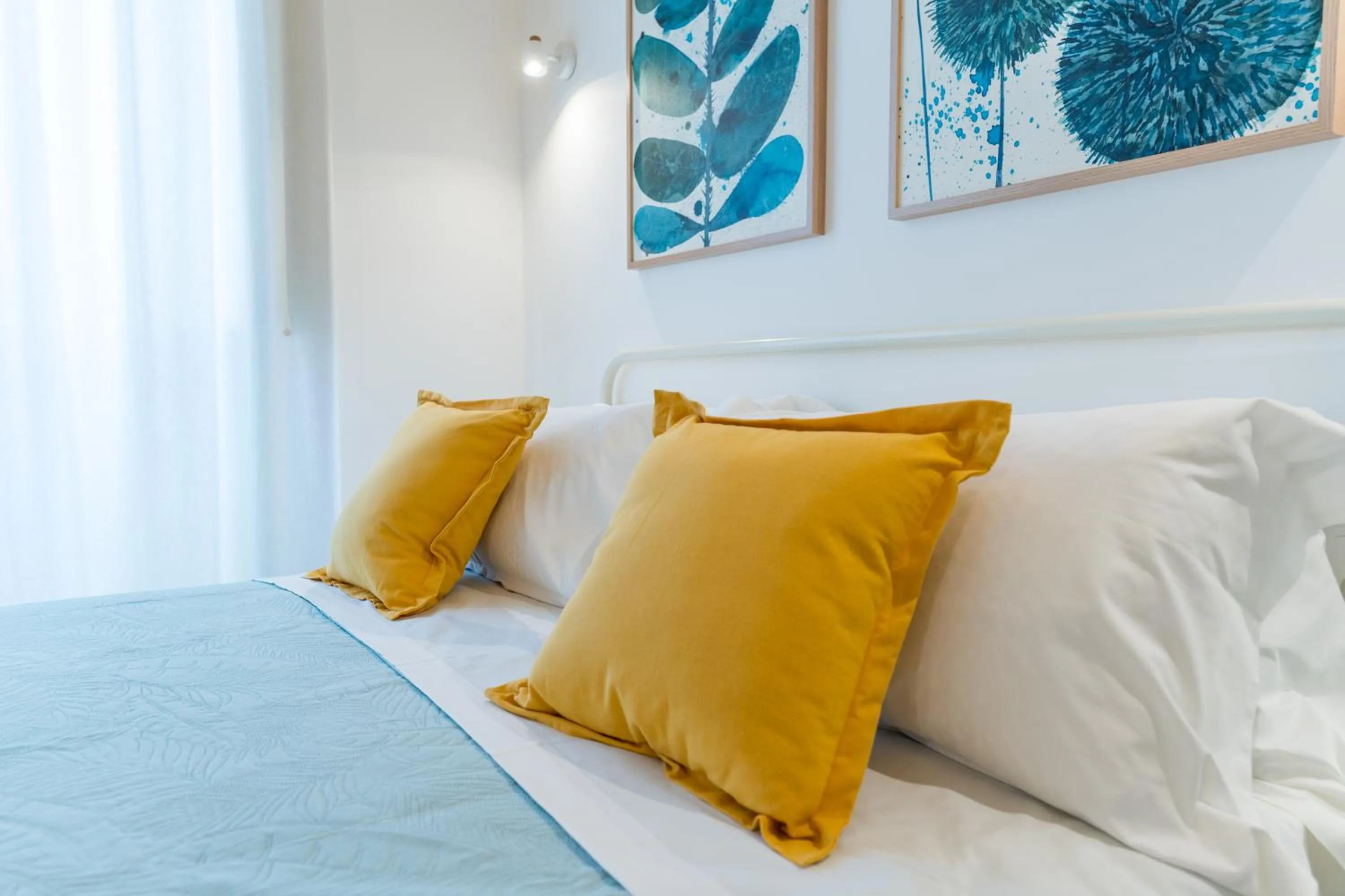 Bed in Mama Tita Rooms and Breakfast