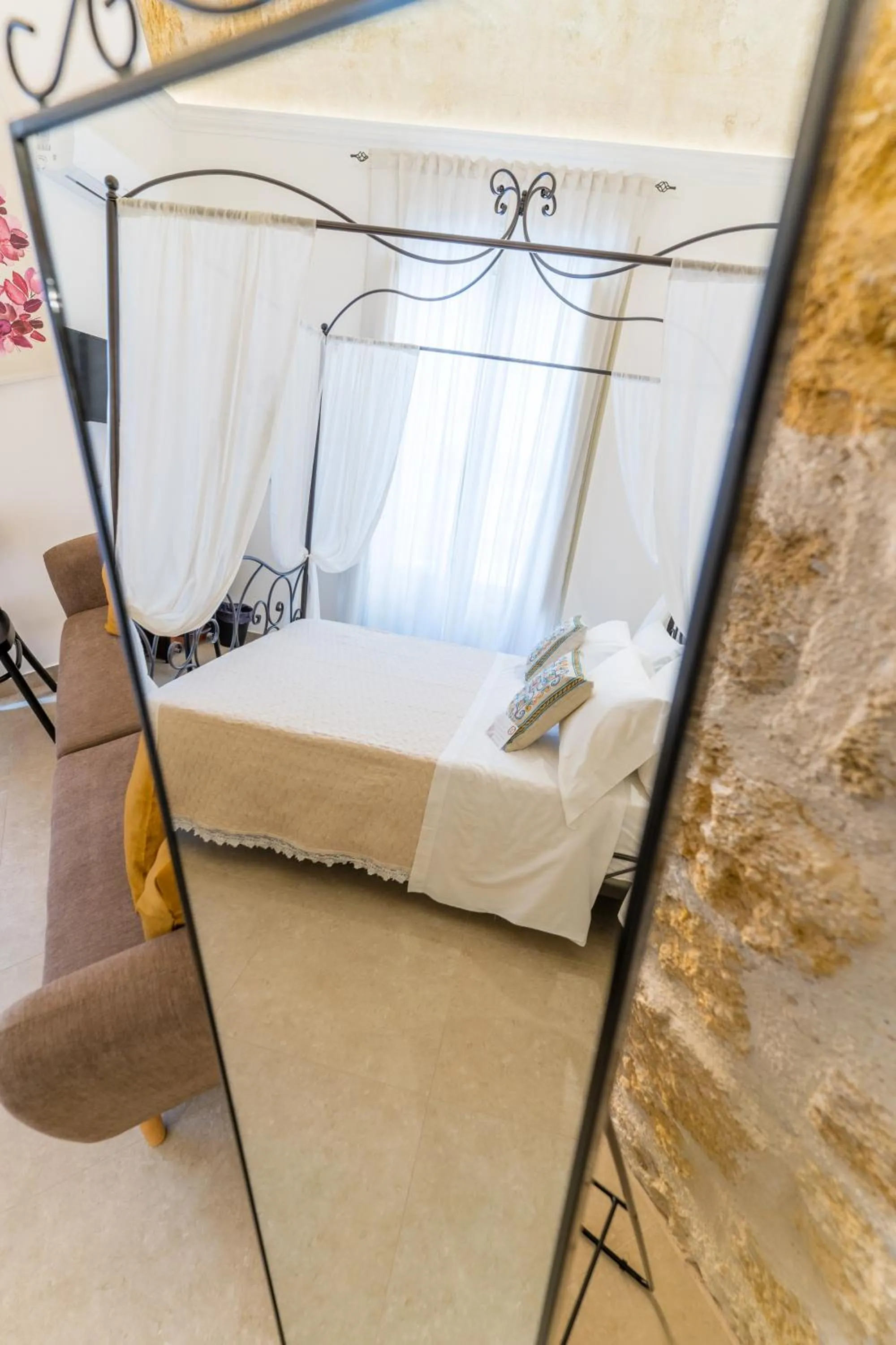 Bed in Mama Tita Rooms and Breakfast