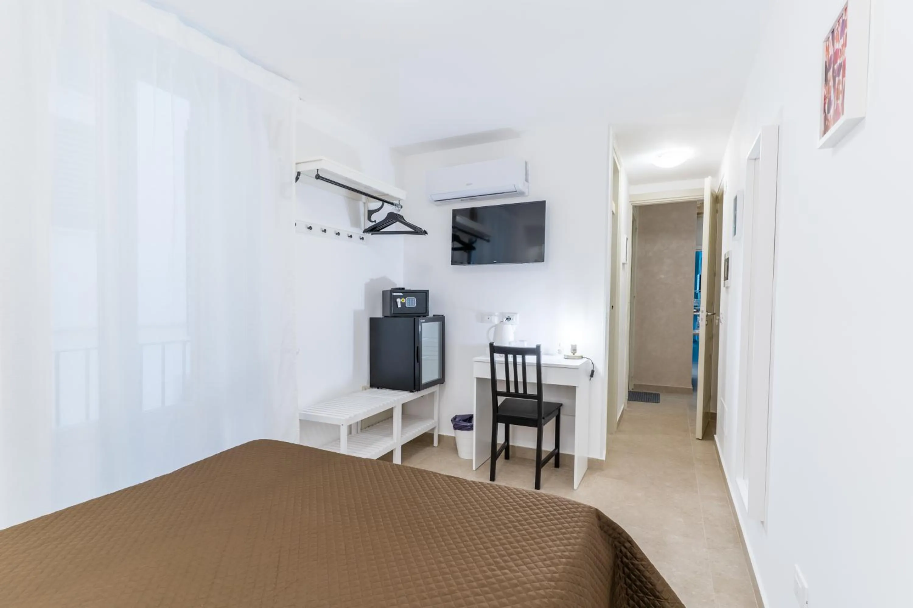 Bed in Mama Tita Rooms and Breakfast