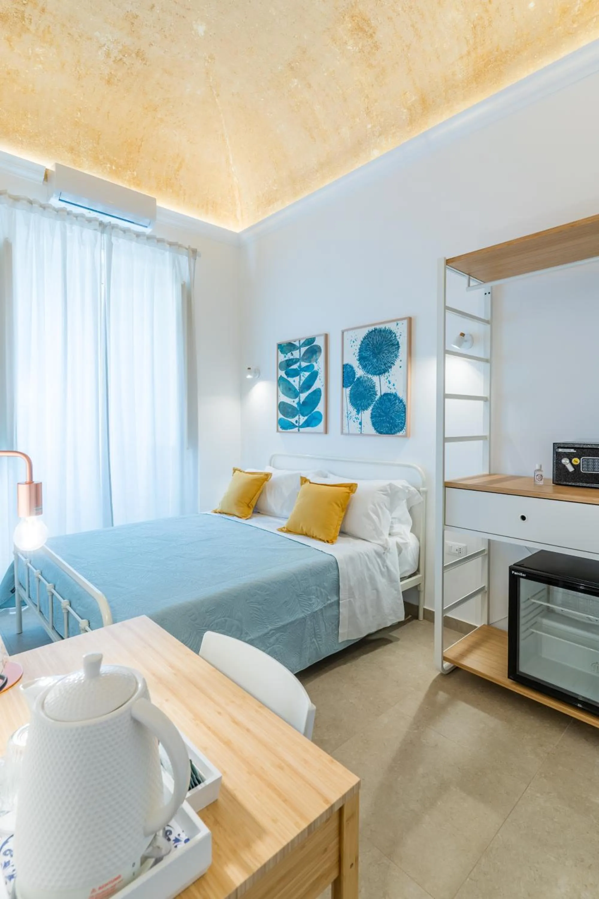 Bed in Mama Tita Rooms and Breakfast