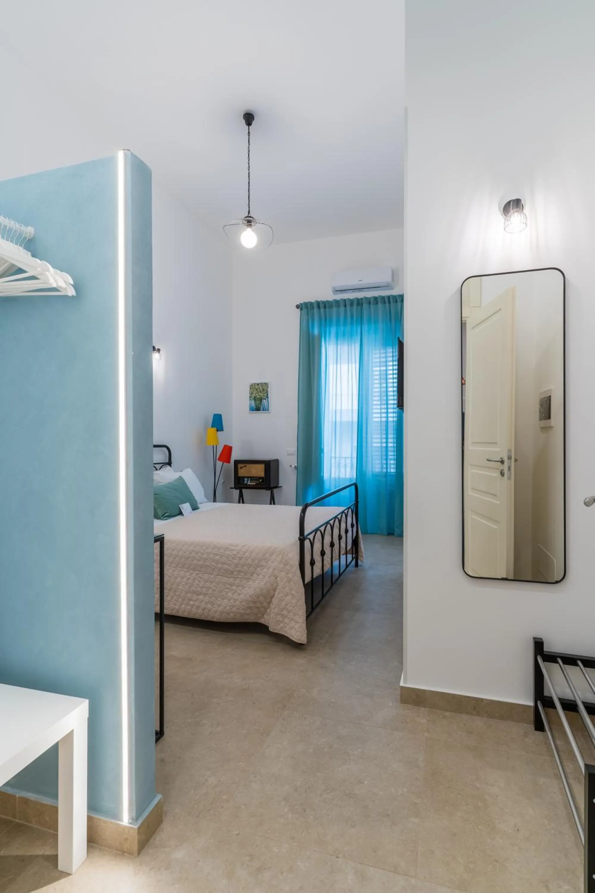 Bed in Mama Tita Rooms and Breakfast