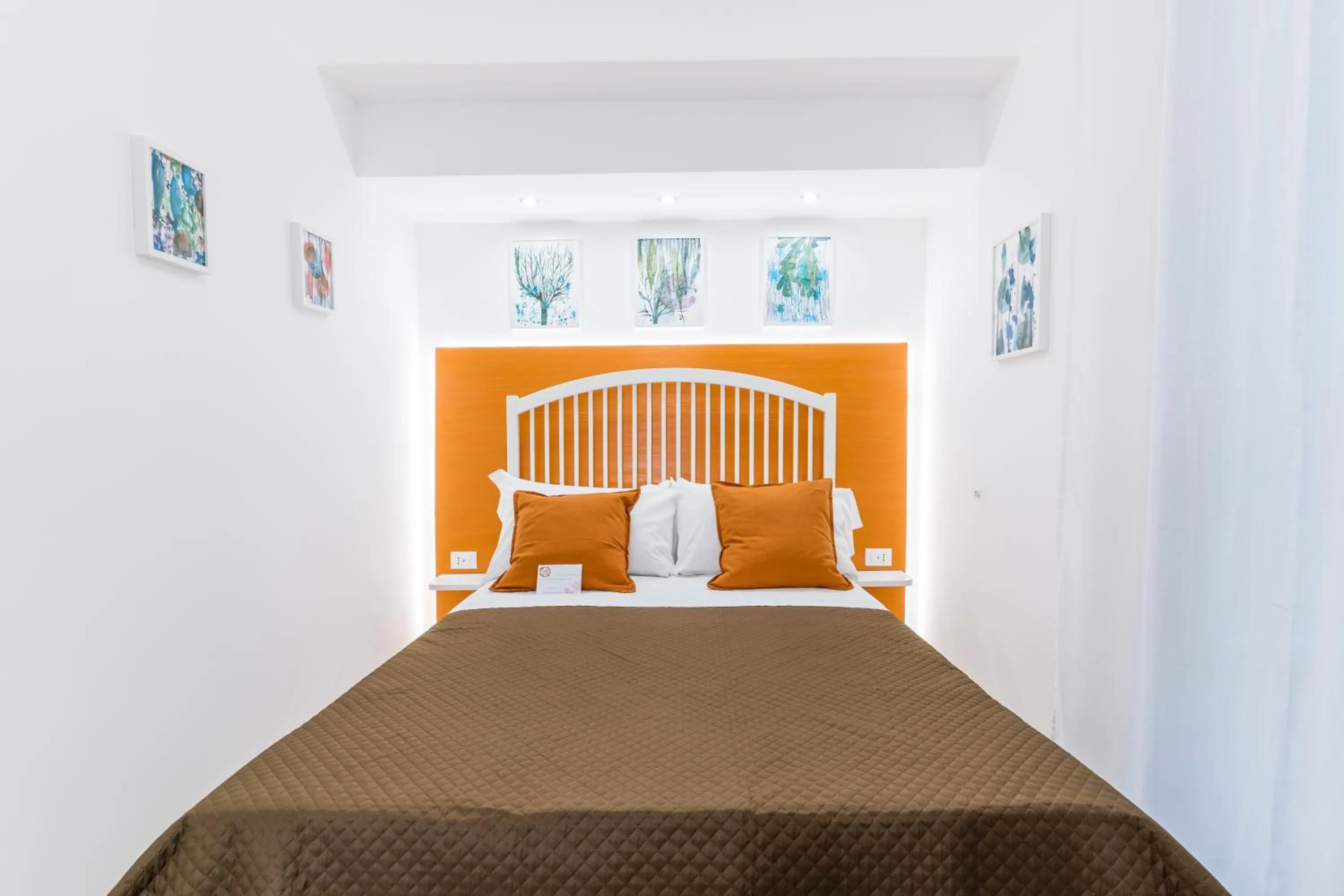 Bed in Mama Tita Rooms and Breakfast