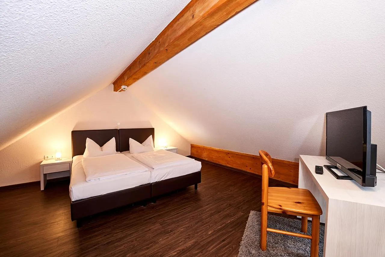 Bed in Brauers Landarthotel GmbH