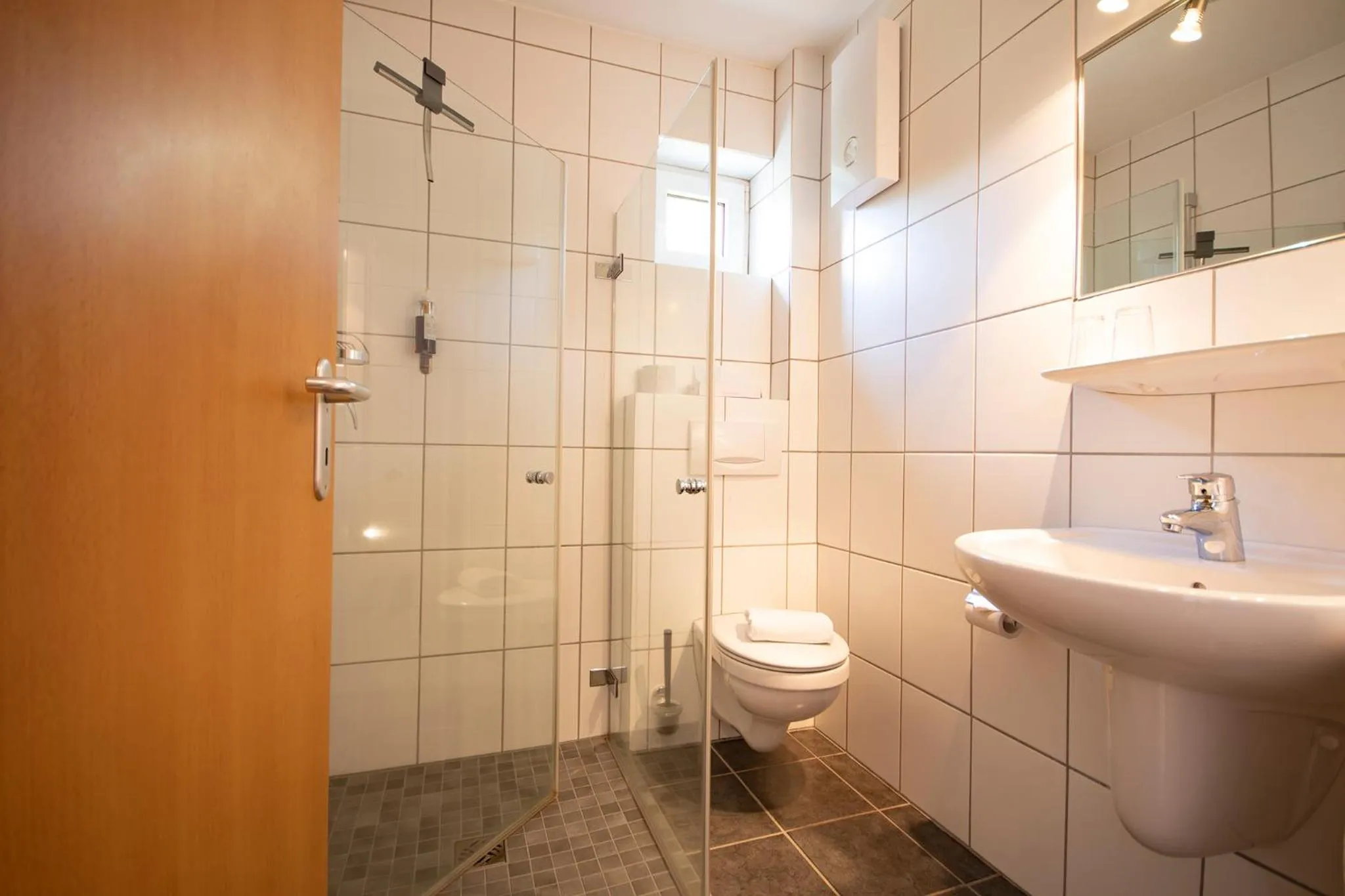 Bathroom in Brauers Landarthotel GmbH