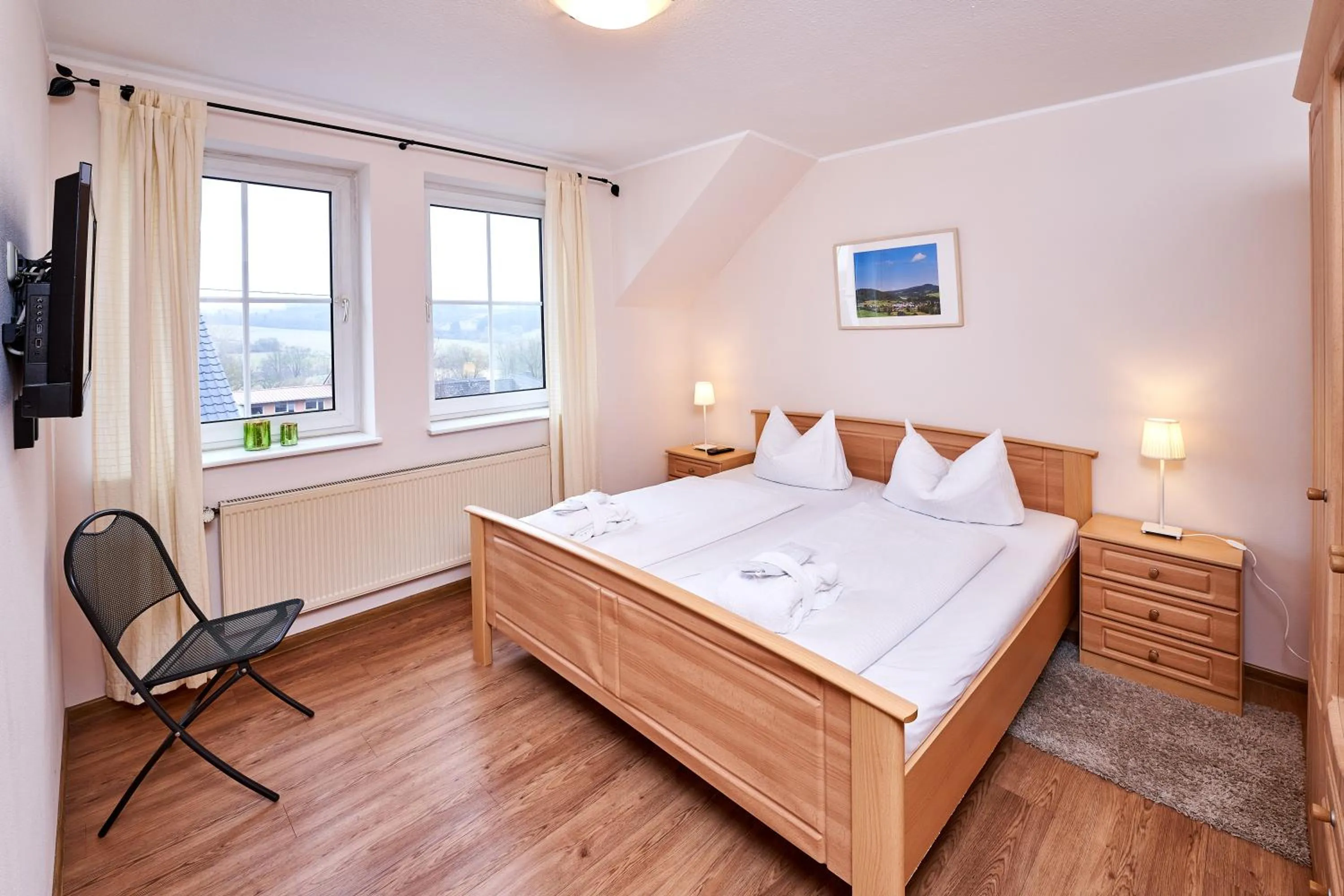 Bed in Brauers Landarthotel GmbH