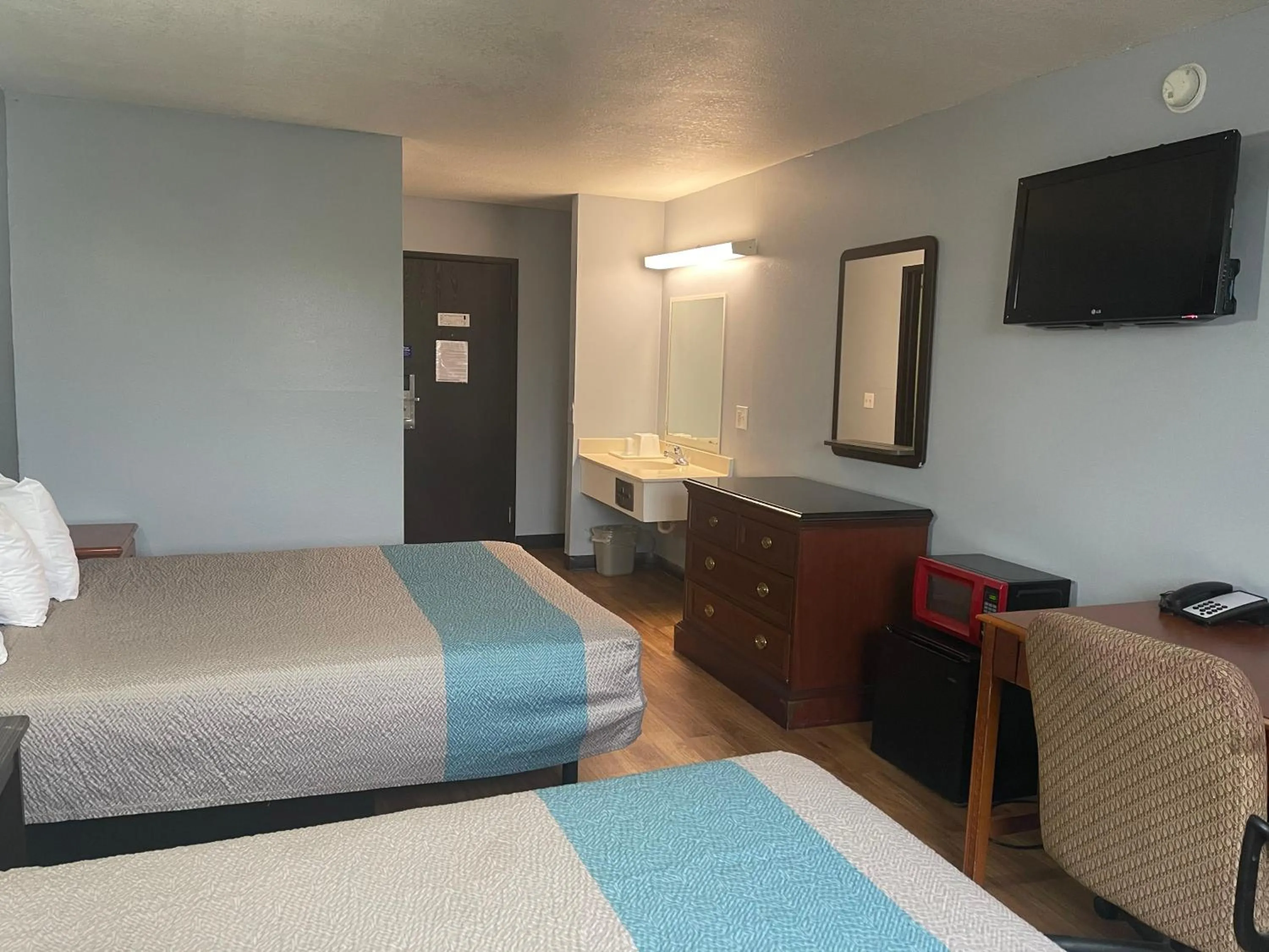 Bed in TROYINN&SUITES