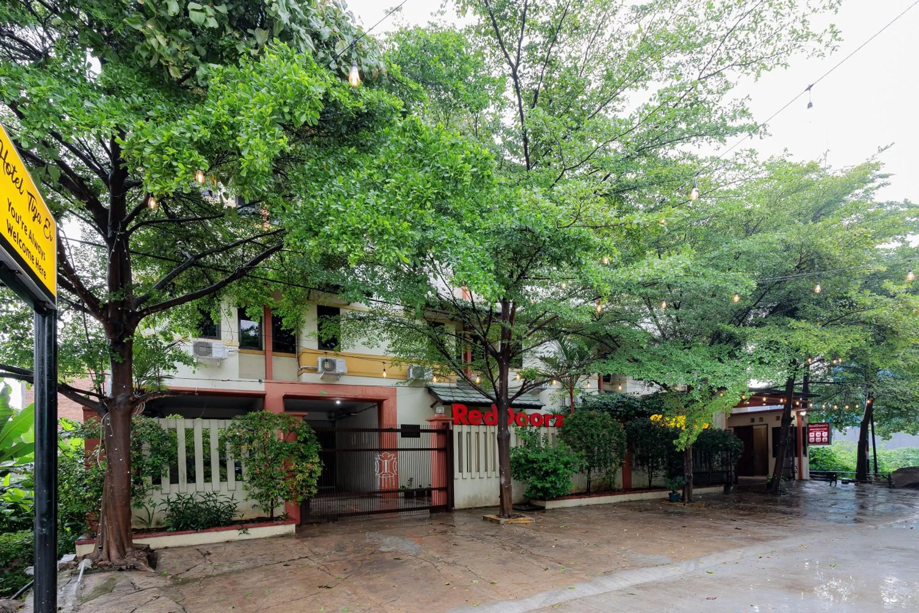 Facade/entrance in RedDoorz Syariah at Hotel Tiga ER near Karawang Central Plaza
