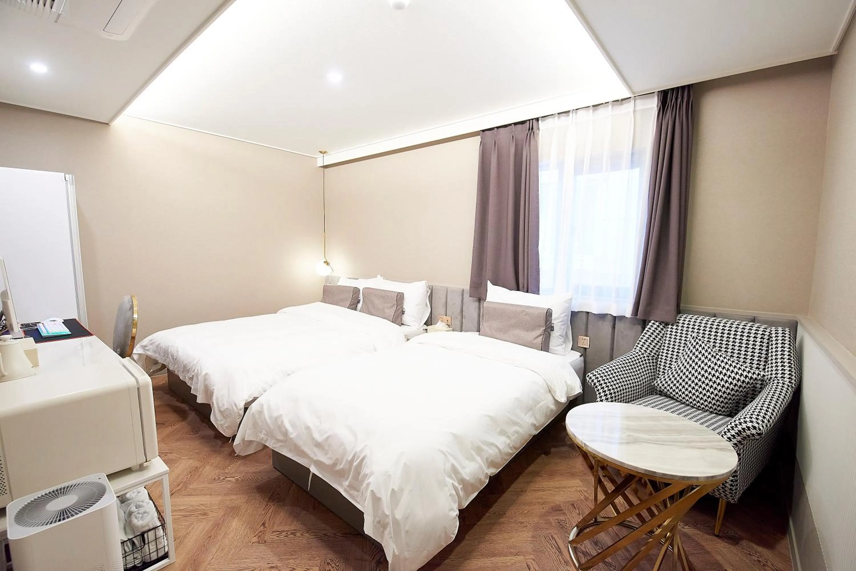 Bed in 사직 덴바스타 시그니처 호텔