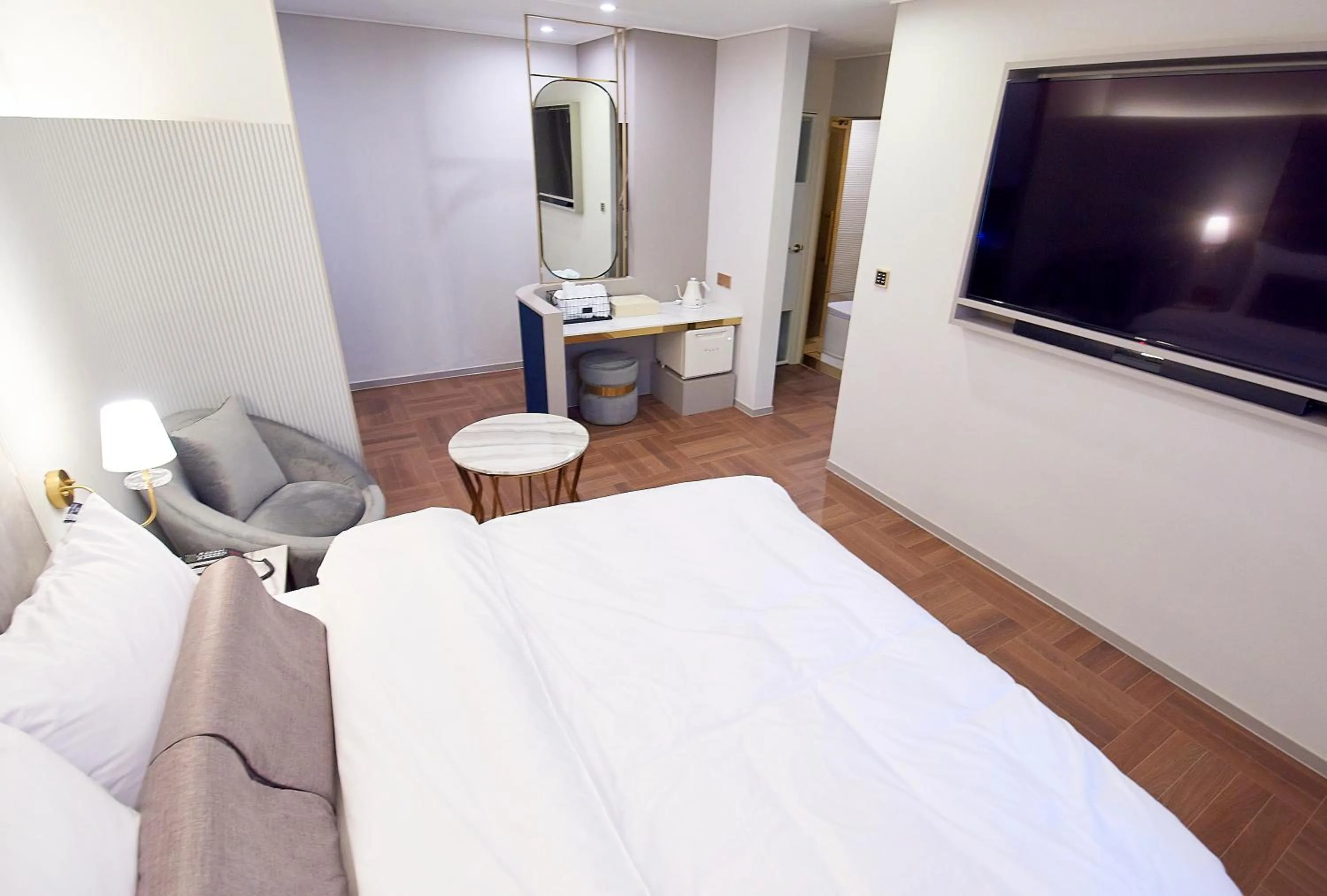 Bed in 사직 덴바스타 시그니처 호텔