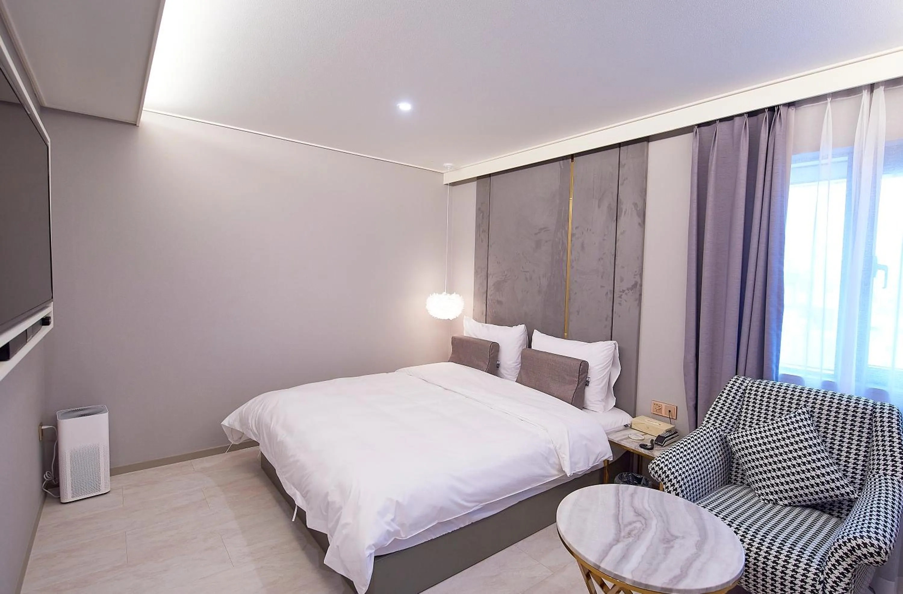 Bed in 사직 덴바스타 시그니처 호텔