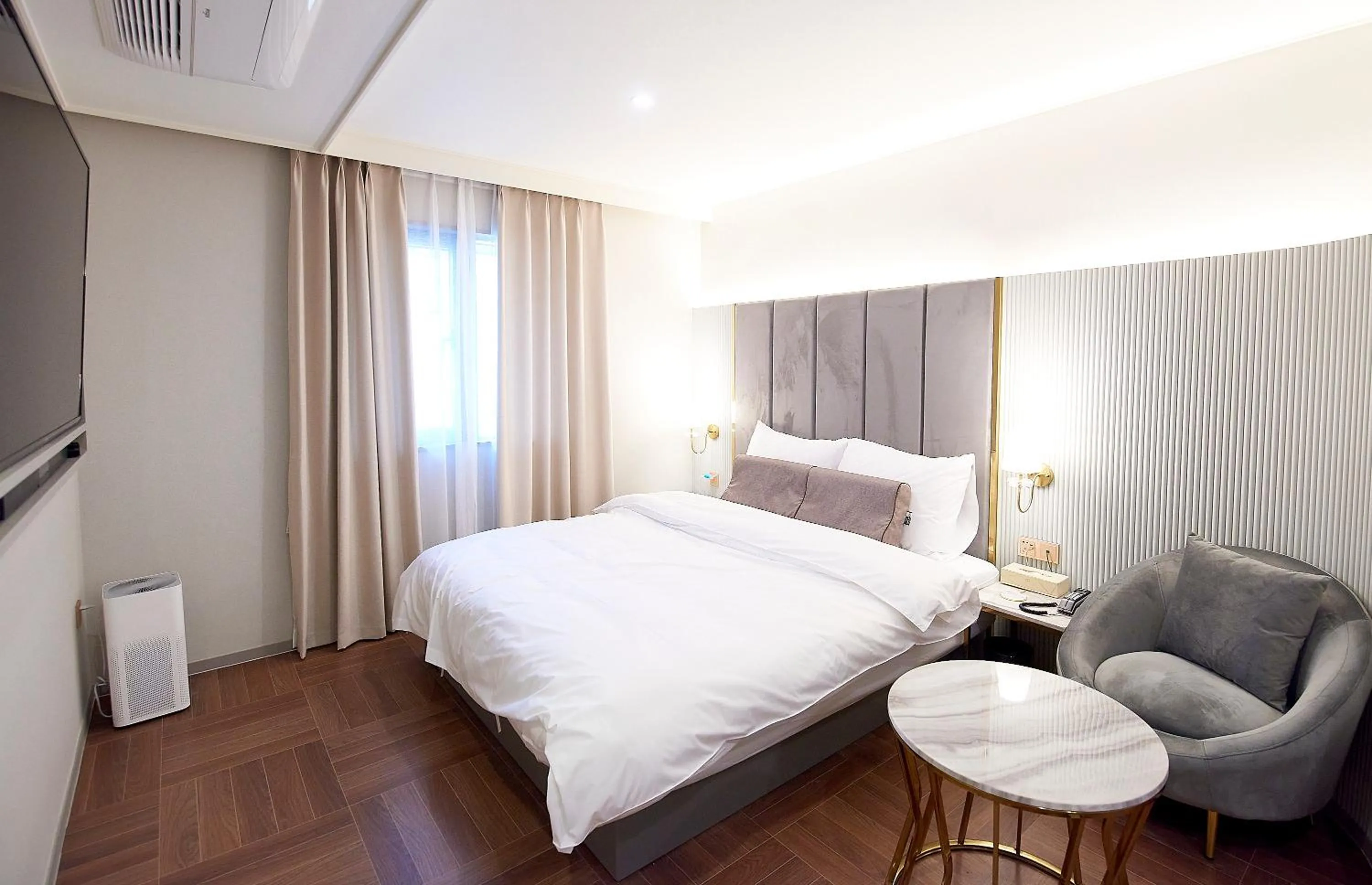 Bed in 사직 덴바스타 시그니처 호텔