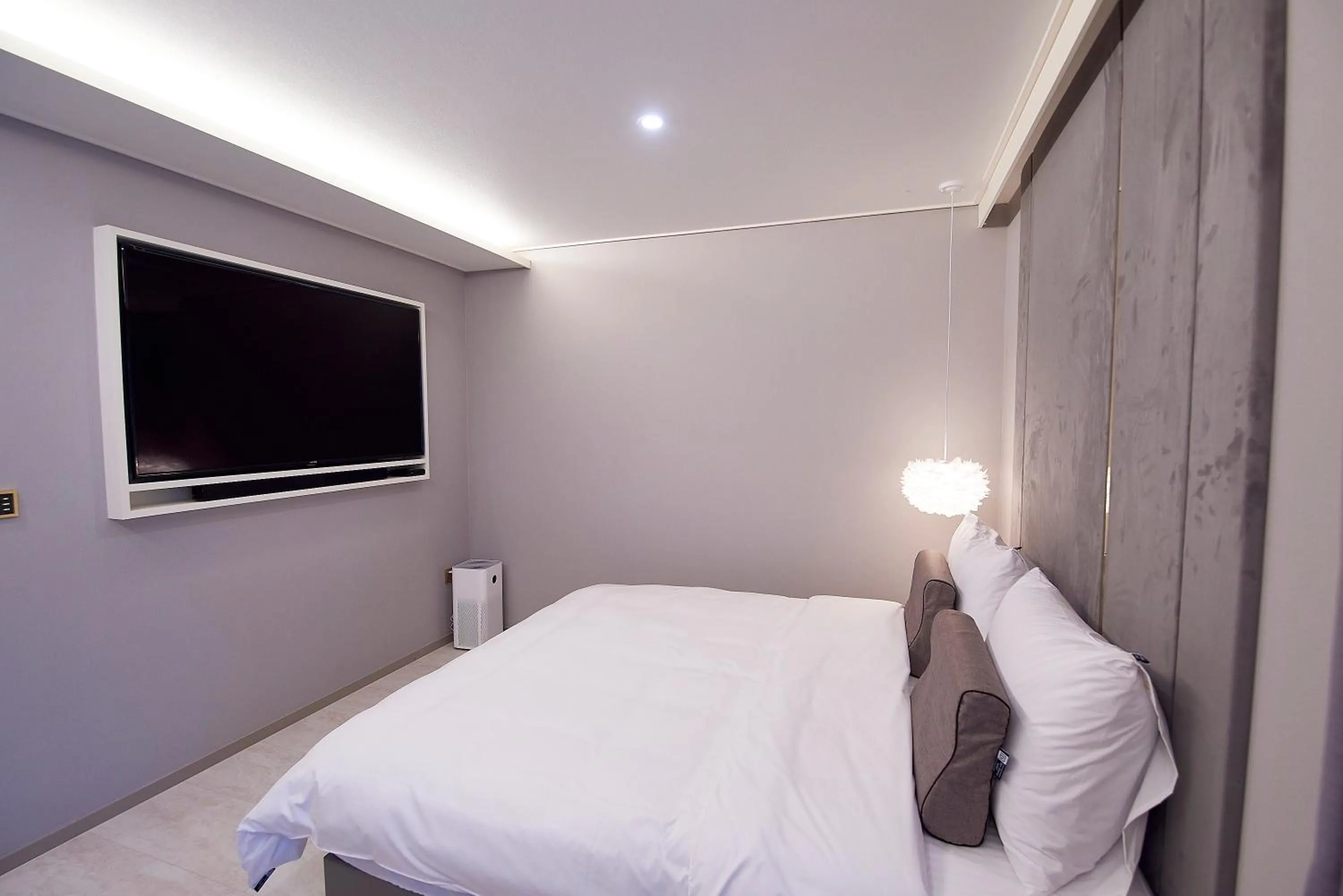 Bed in 사직 덴바스타 시그니처 호텔