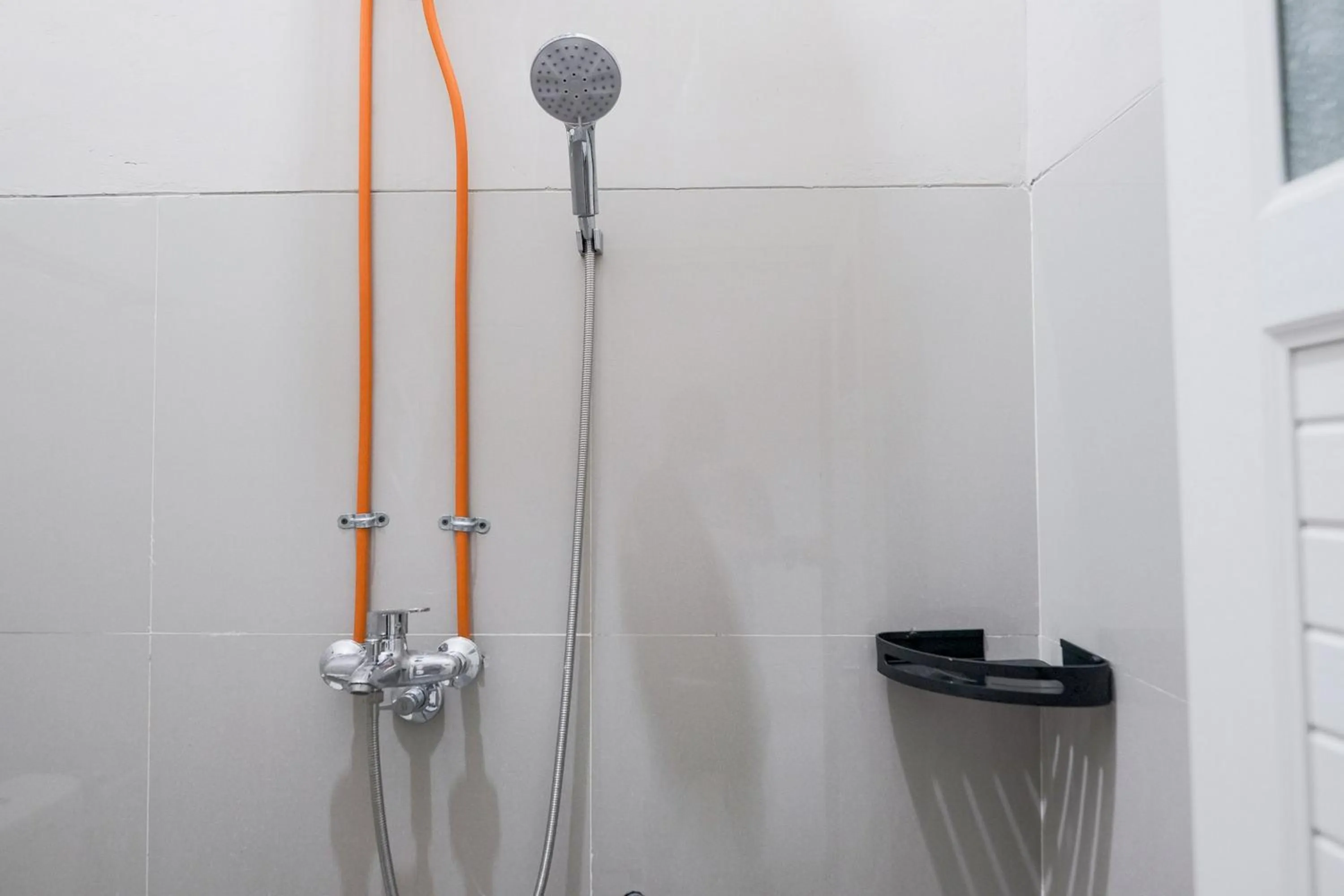 Bathroom in RedDoorz Syariah near Hajimena Lampung