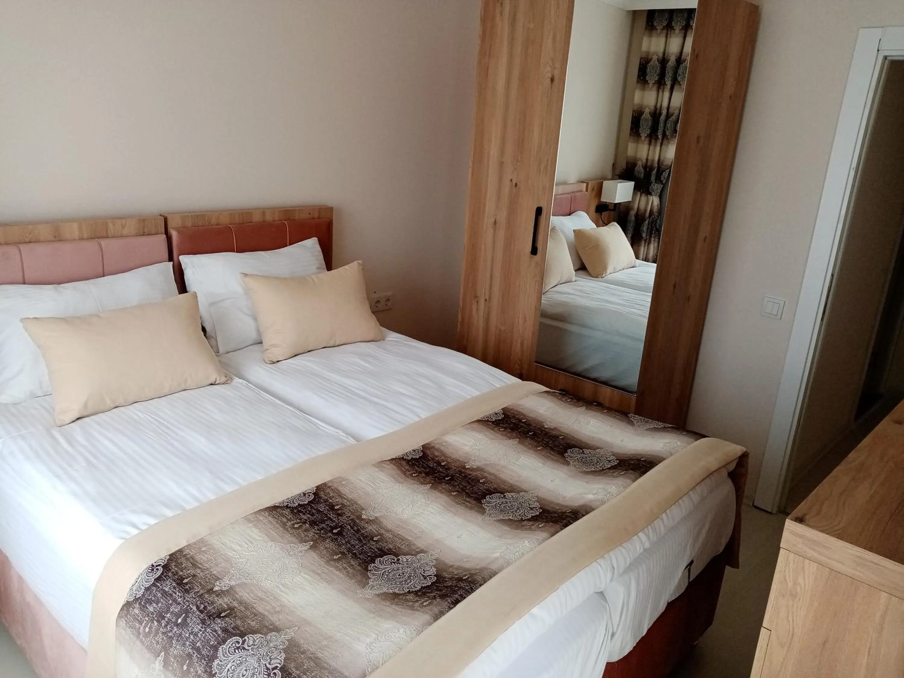 Bed in Alfa Apart Hotel