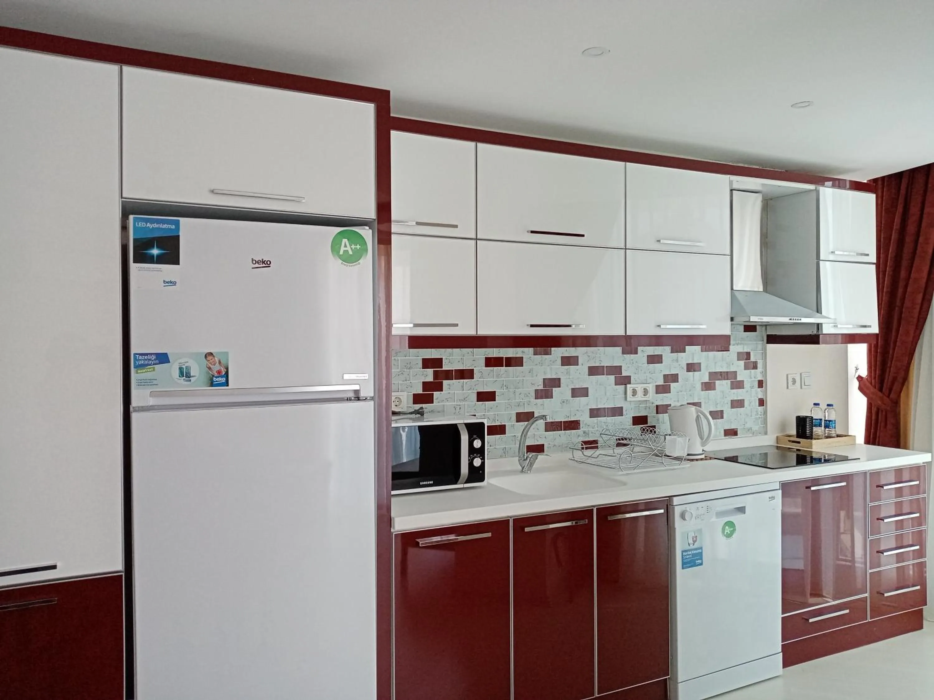 Kitchen or kitchenette in Alfa Apart Hotel