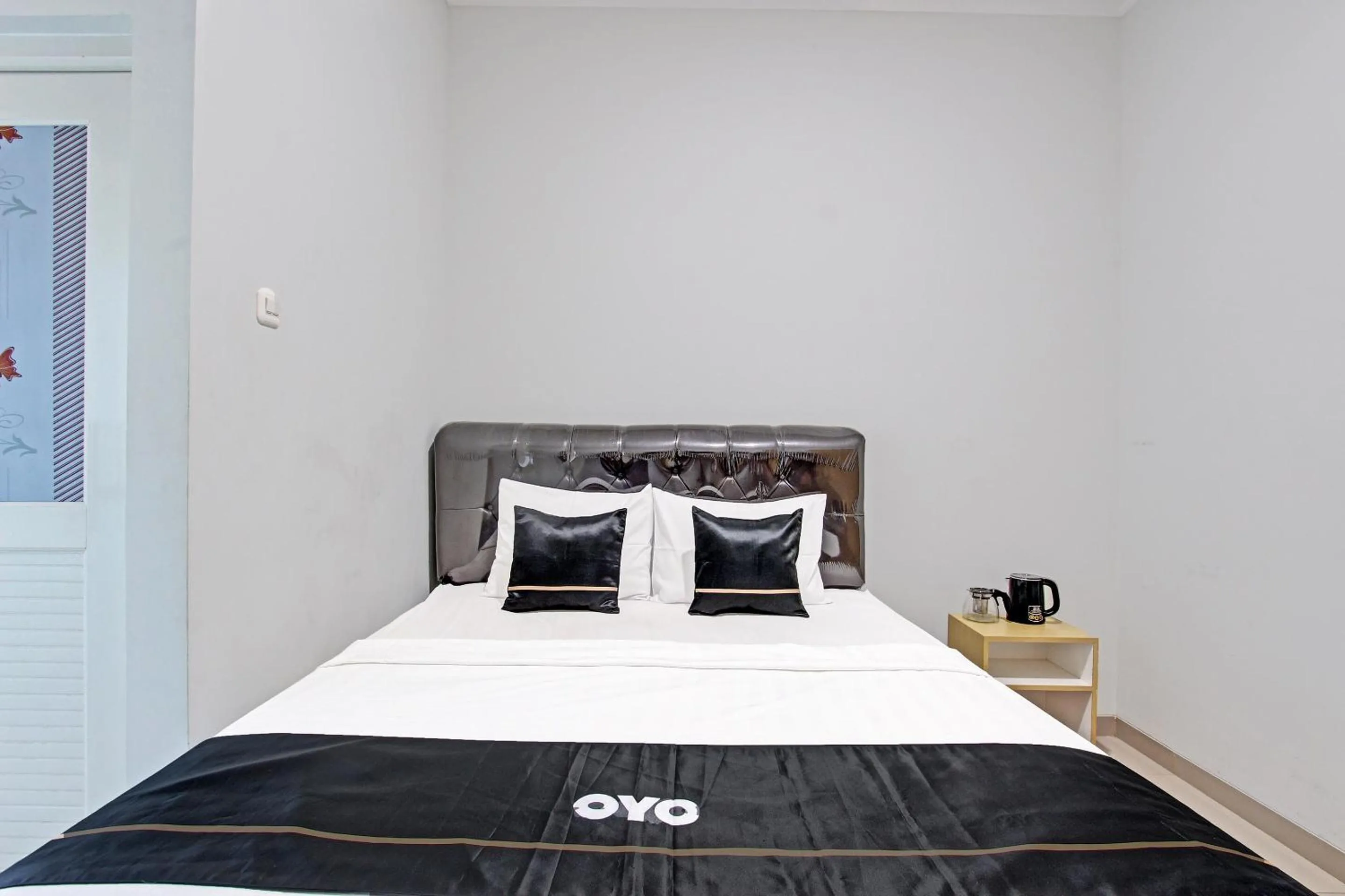 Bedroom in Capital O 91377 Mk Prime Syariah