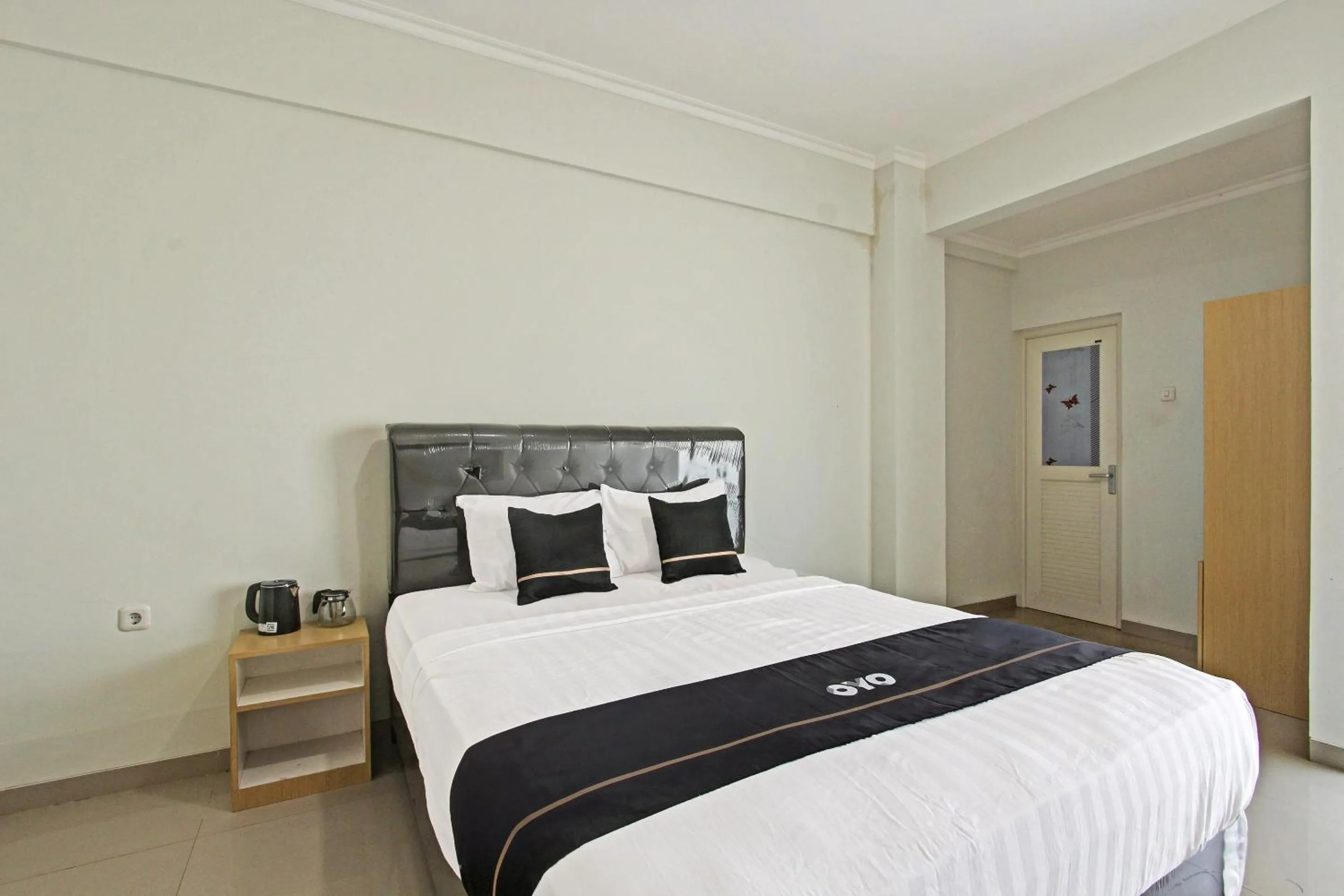 Bedroom in Capital O 91377 Mk Prime Syariah