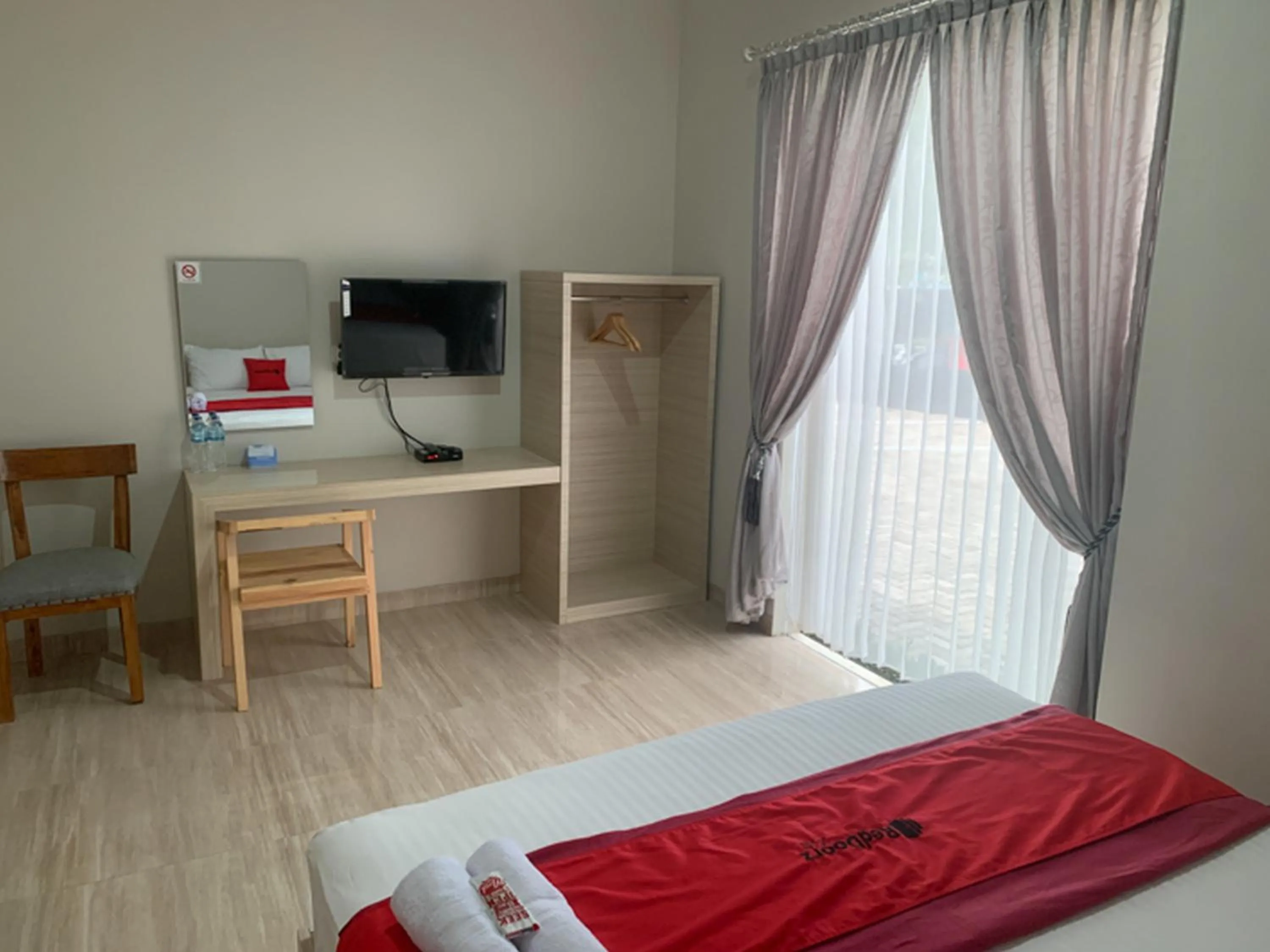 Bed in RedDoorz near Alun Alun Purbalingga