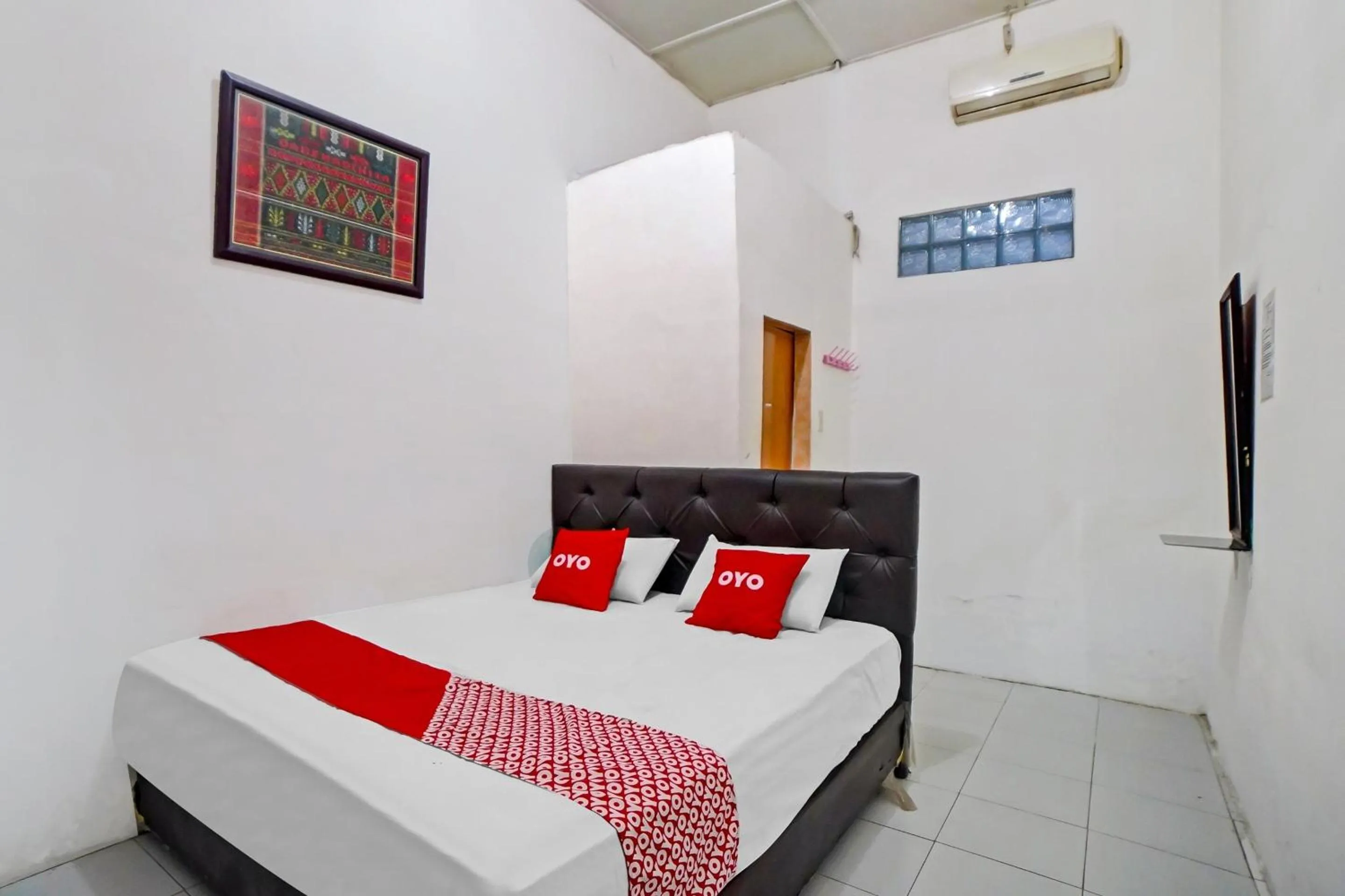 Bedroom in Hotel O Darussalam Inn