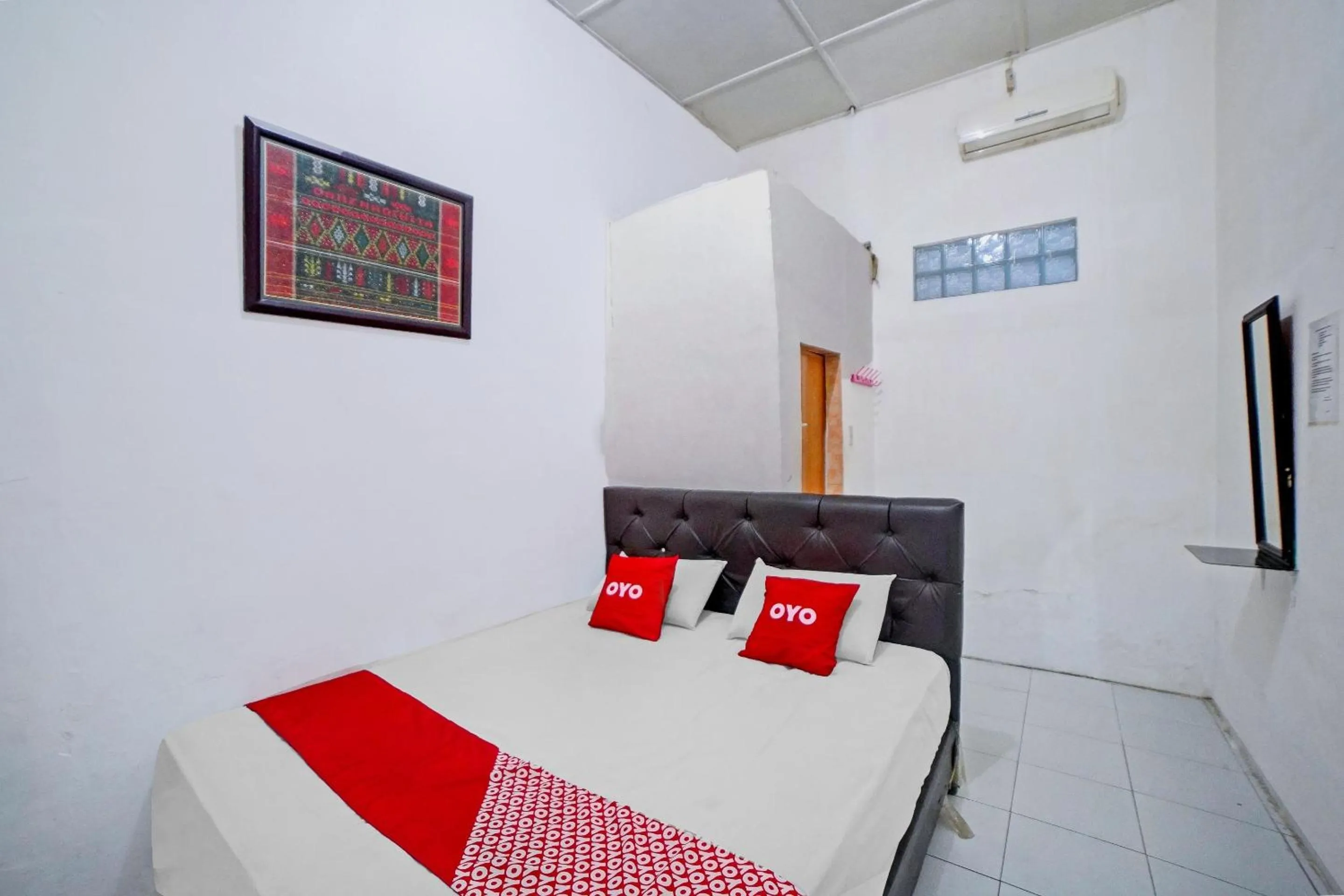 Bedroom in Hotel O Darussalam Inn