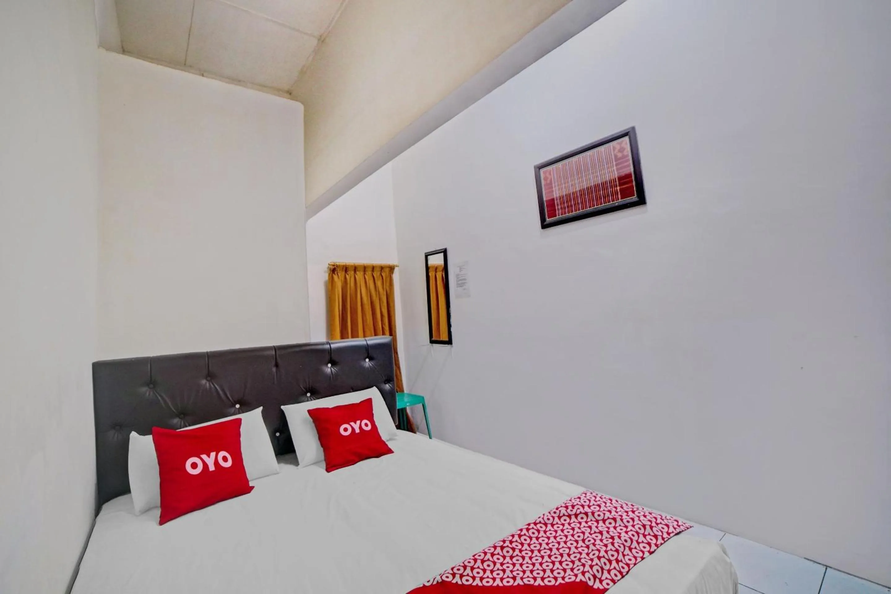 Bedroom in Hotel O Darussalam Inn