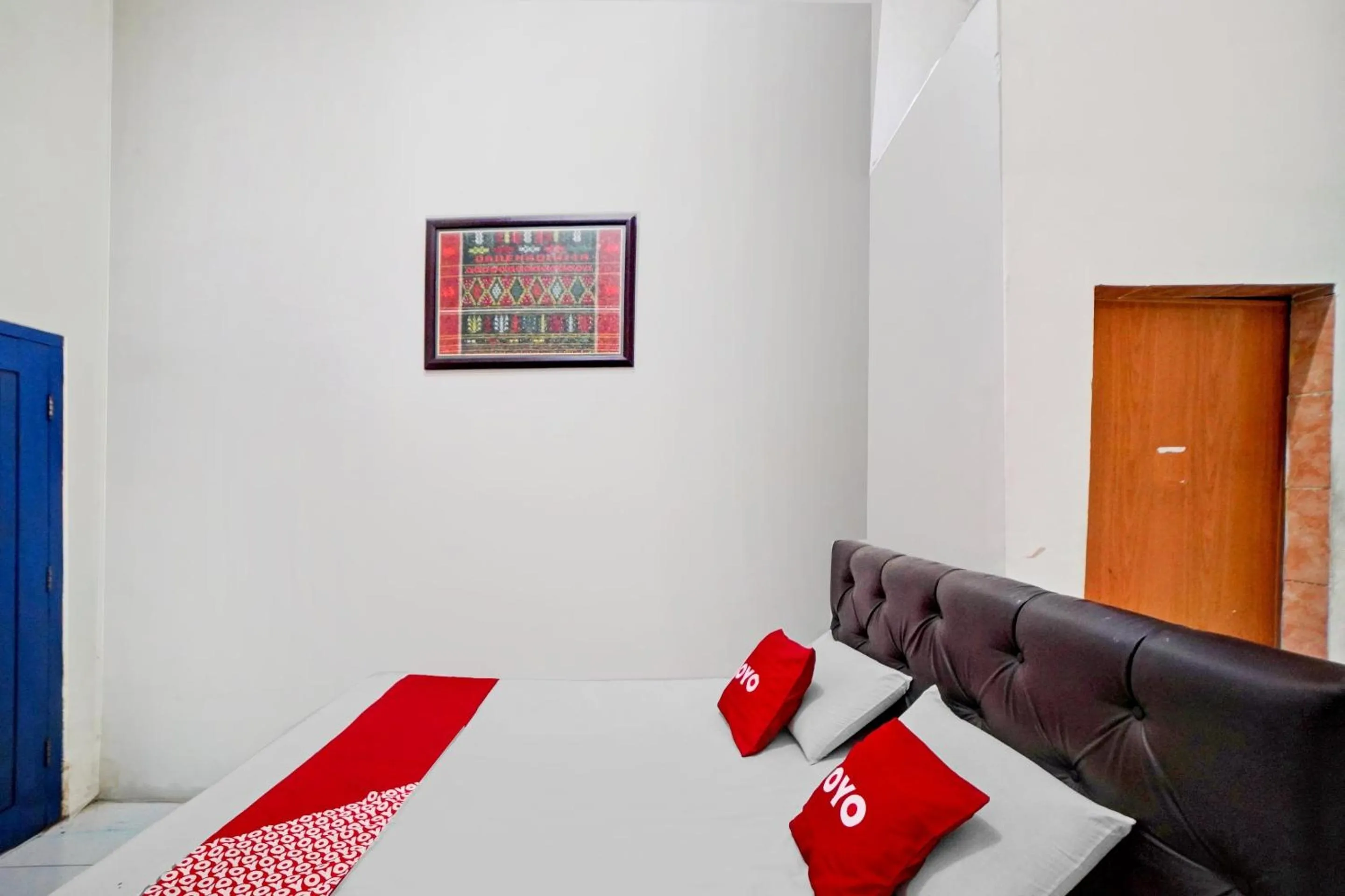 Bedroom in Hotel O Darussalam Inn