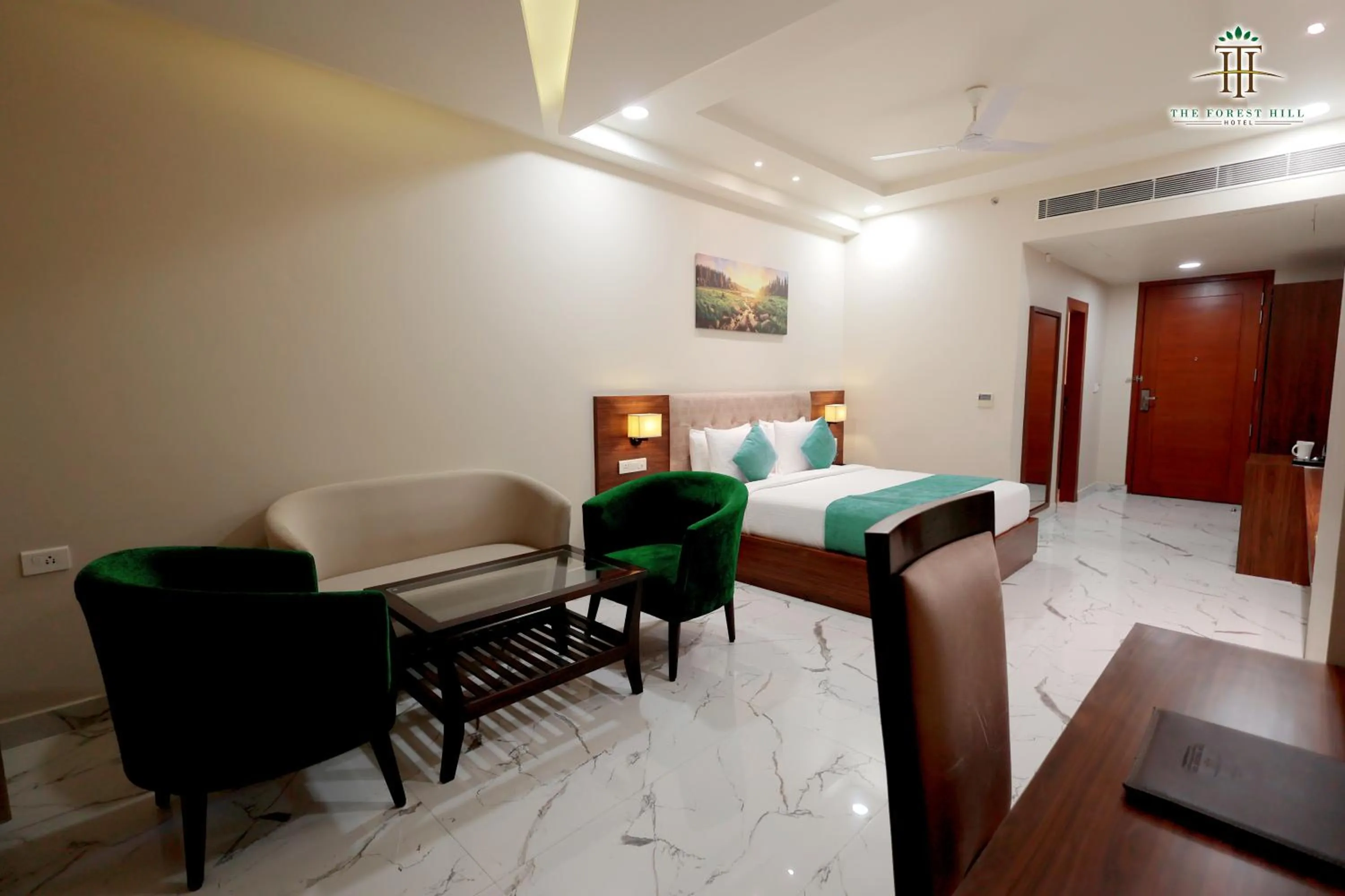 Seating area, Bed in The Forest Hill Hotel