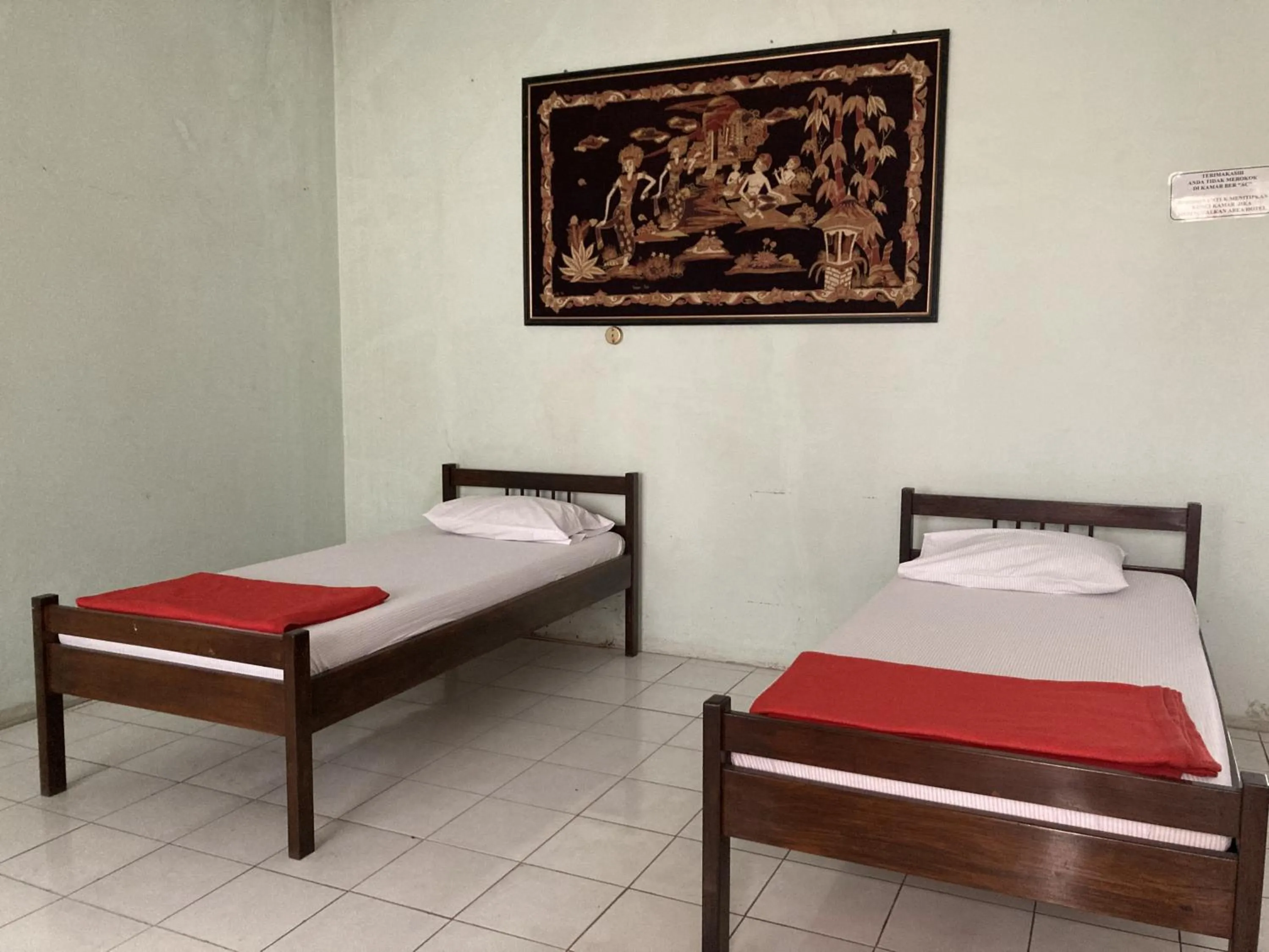 Bed in Hotel Garuda Syariah near Alun Alun Banjarnegara
