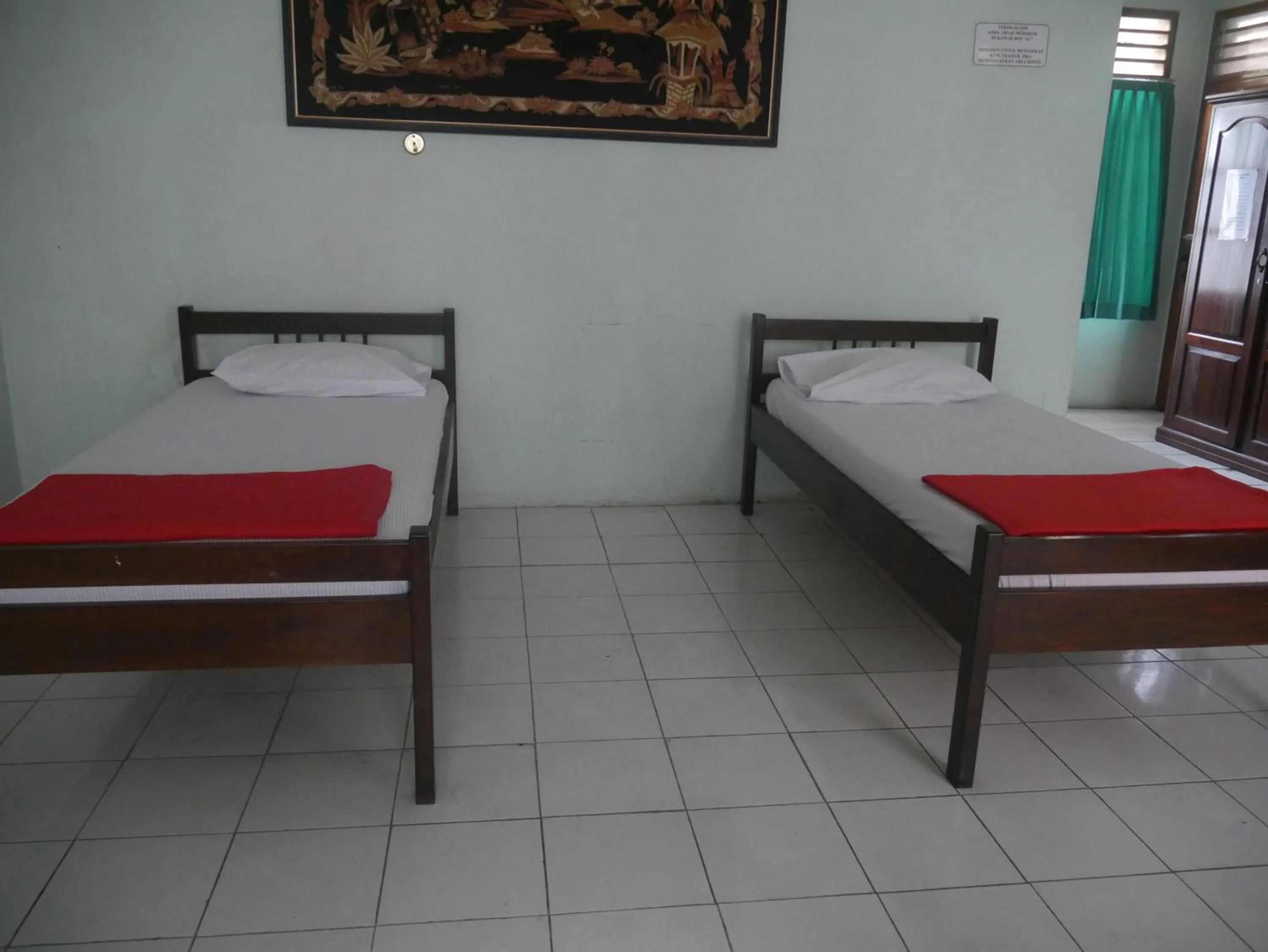Bed in Hotel Garuda Syariah near Alun Alun Banjarnegara
